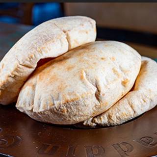 Order Pita bread  food online from Aladdin Cafe store, San Diego on bringmethat.com