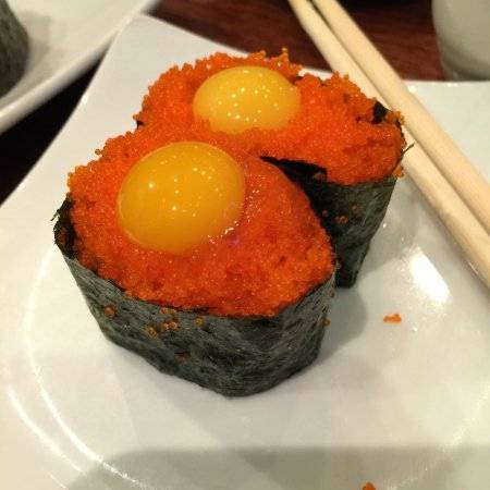 Order Smelt Fish Roe With Quail Egg Nigiri food online from Formosa store, IOWA CITY on bringmethat.com