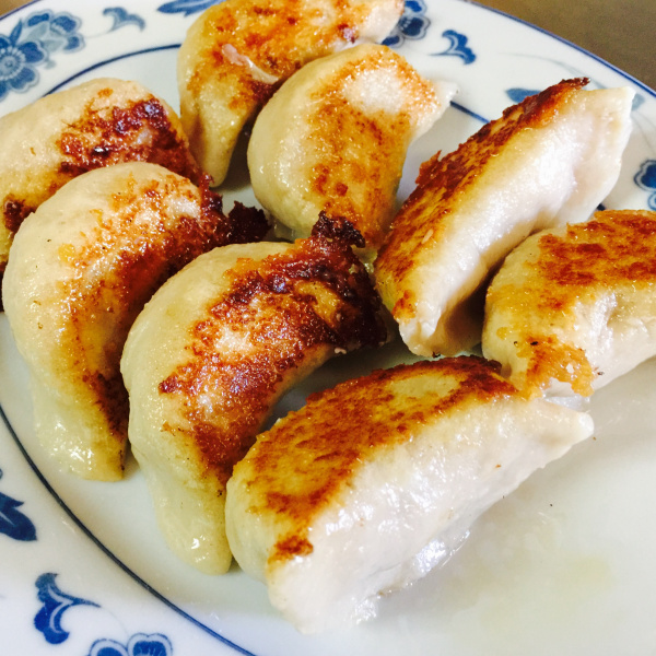 Order 8 Piece Fried Dumplings with Pork food online from Fengling Restaurant store, Houston on bringmethat.com
