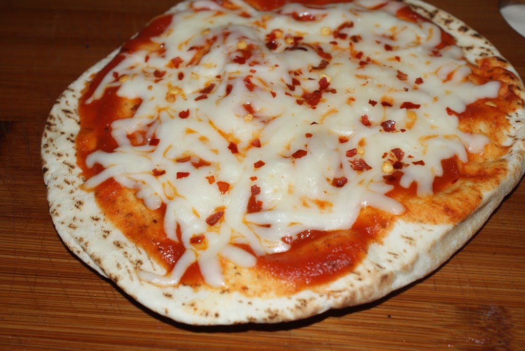 Order Neapolitan Cheese Pizza - Small 10" food online from Giardino Pizzeria & Restaurant store, Glade Spring on bringmethat.com