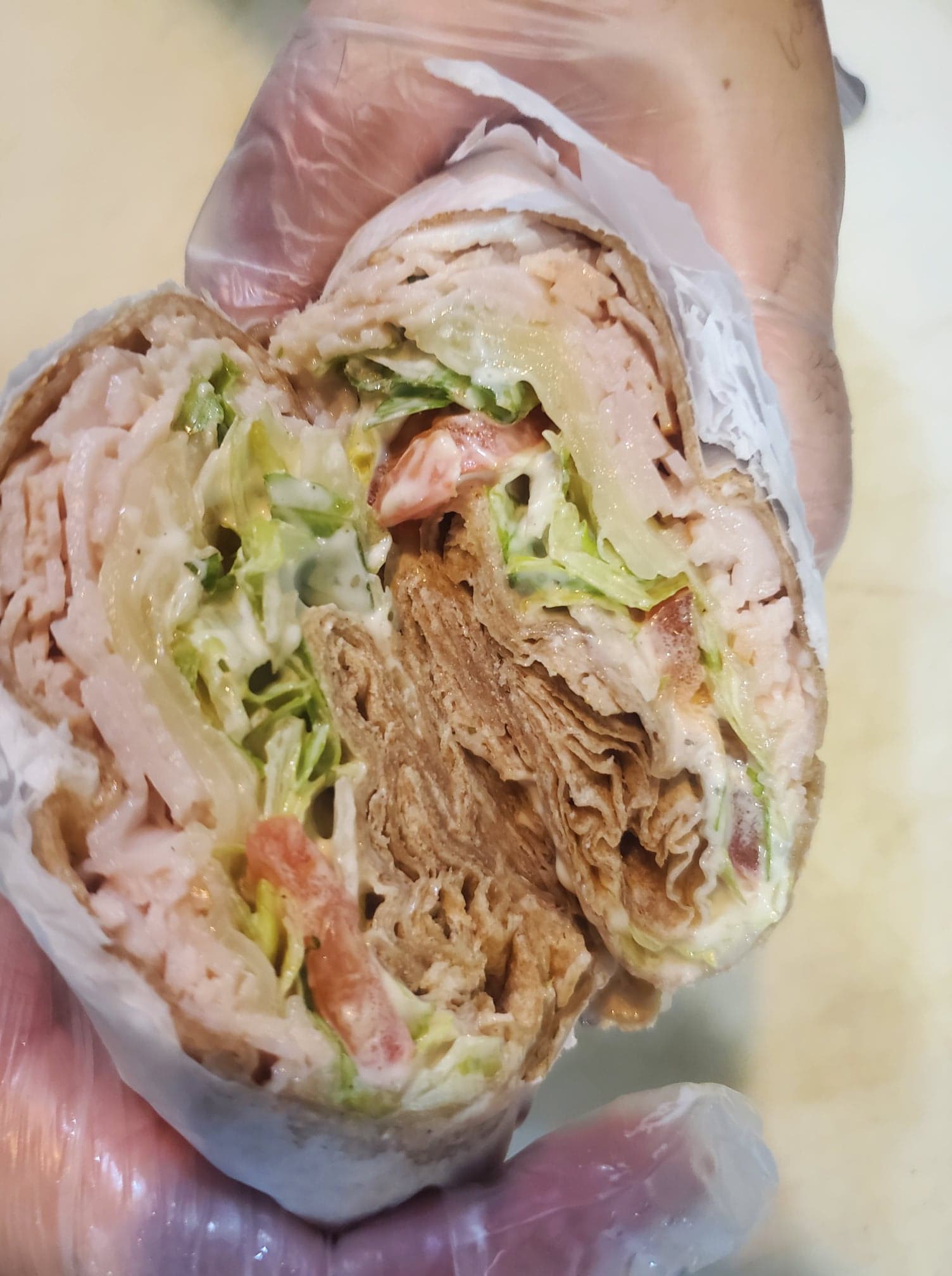 Order Turkey Temptation Wrap food online from Island Smoothie Cafe store, Bethpage on bringmethat.com