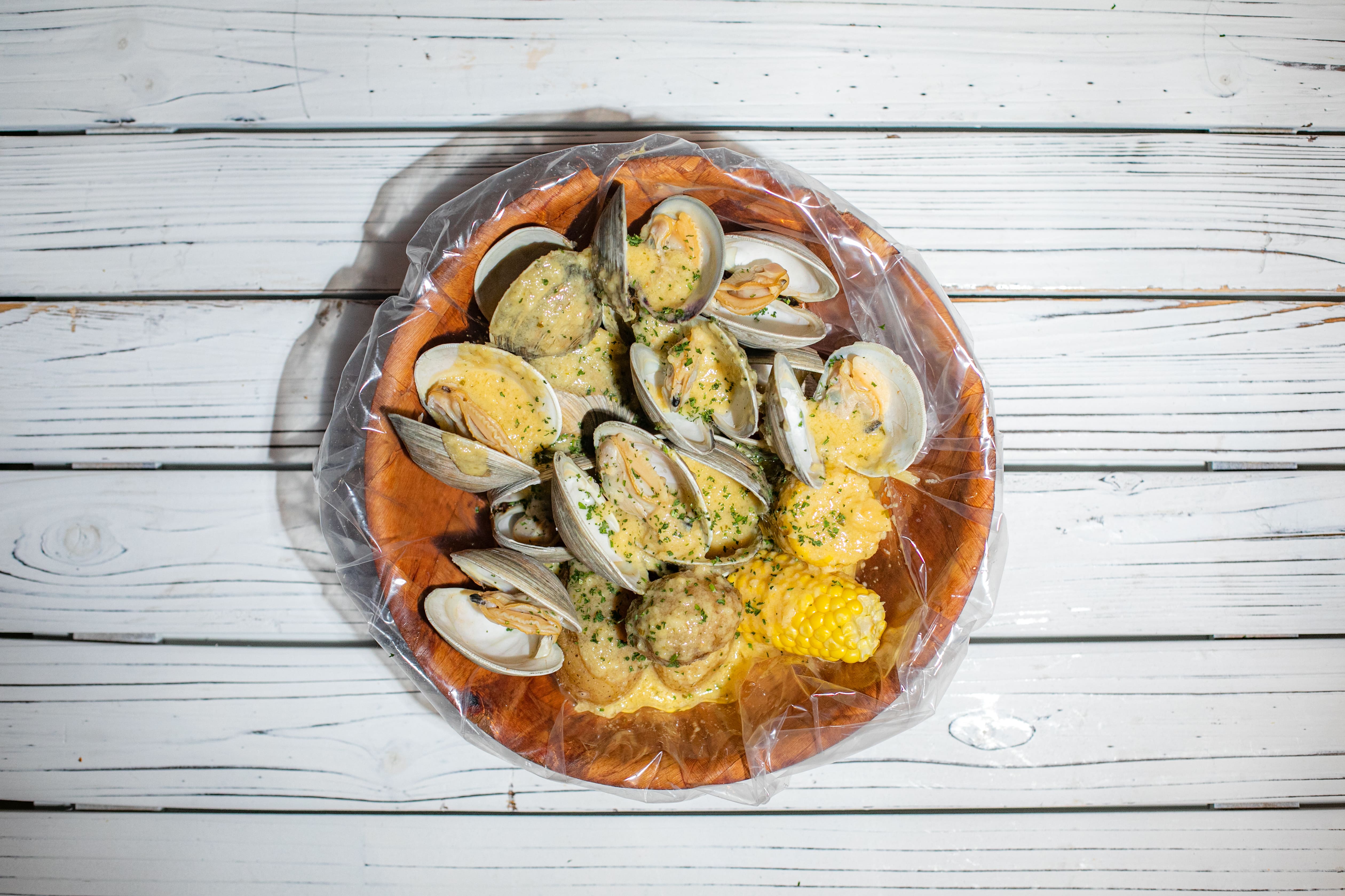 Order 1 lb. Clams food online from Ben's Crab store, Uniondale on bringmethat.com