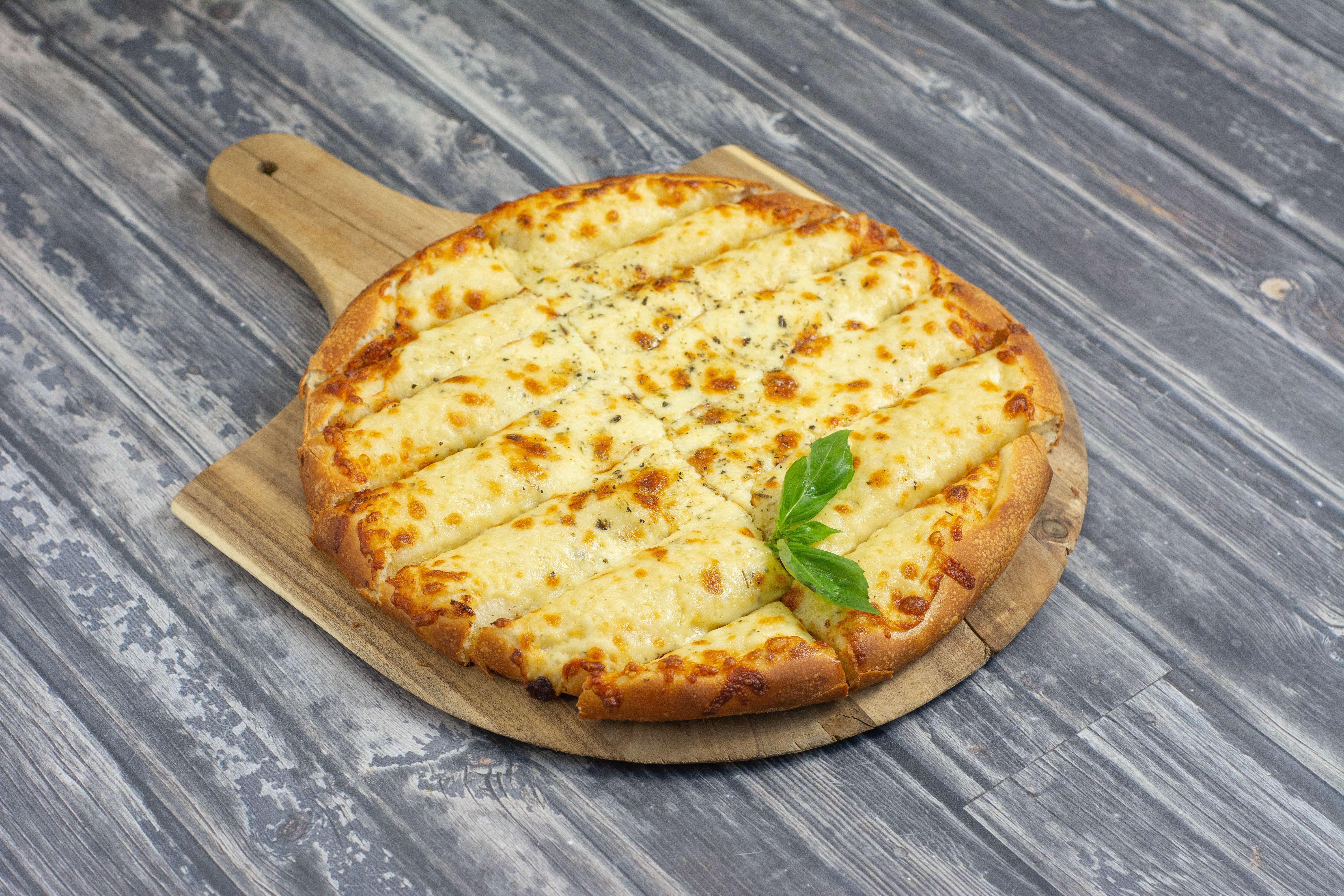 Order Breadsticks food online from Legends Pizza store, Cupertino on bringmethat.com