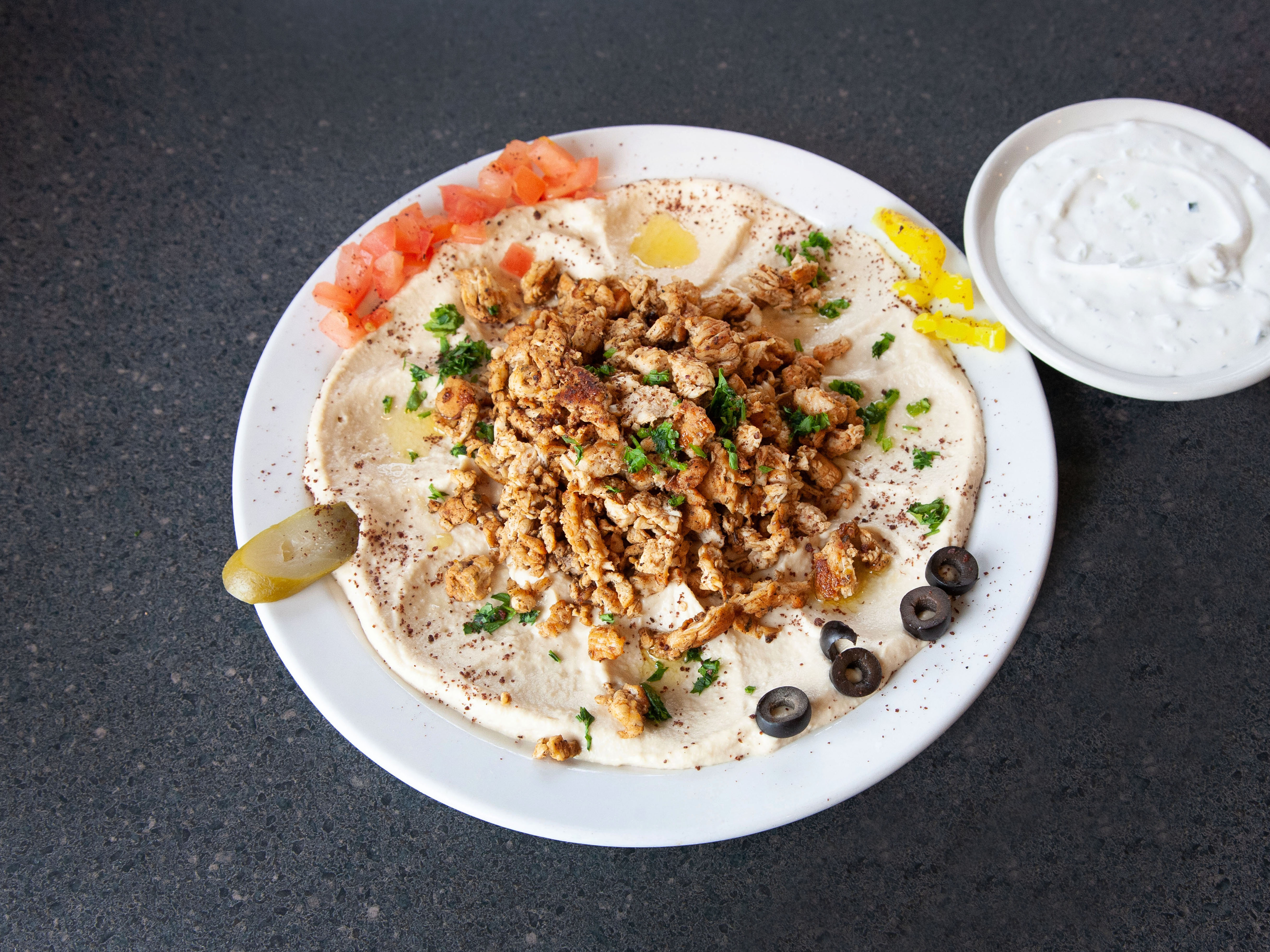 Order Hummus with Shawarma food online from Mirage Mediterranean* store, Louisville on bringmethat.com