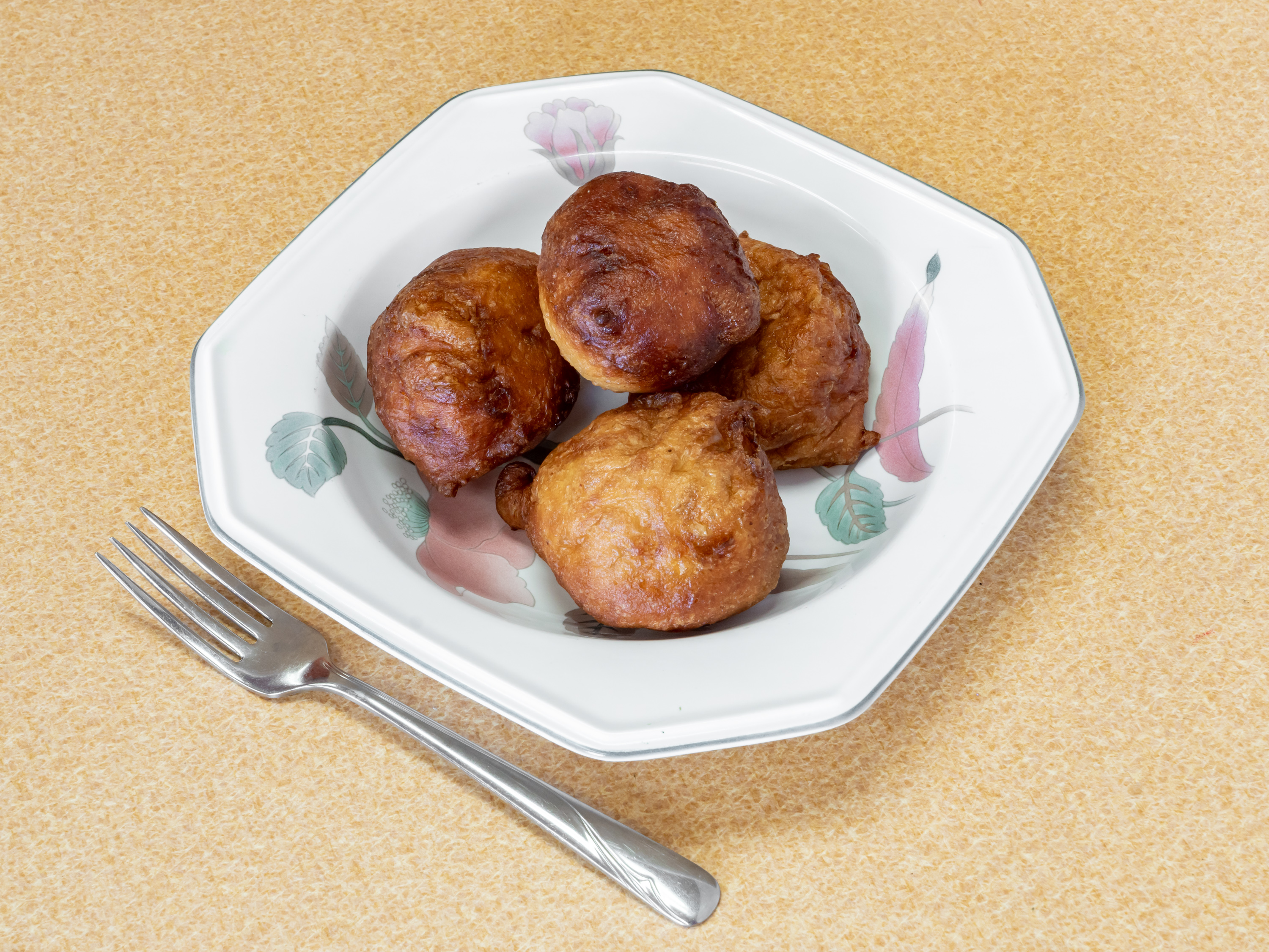 Order 4 Piece Puff Puff food online from Toni's African Deli store, Crystal on bringmethat.com