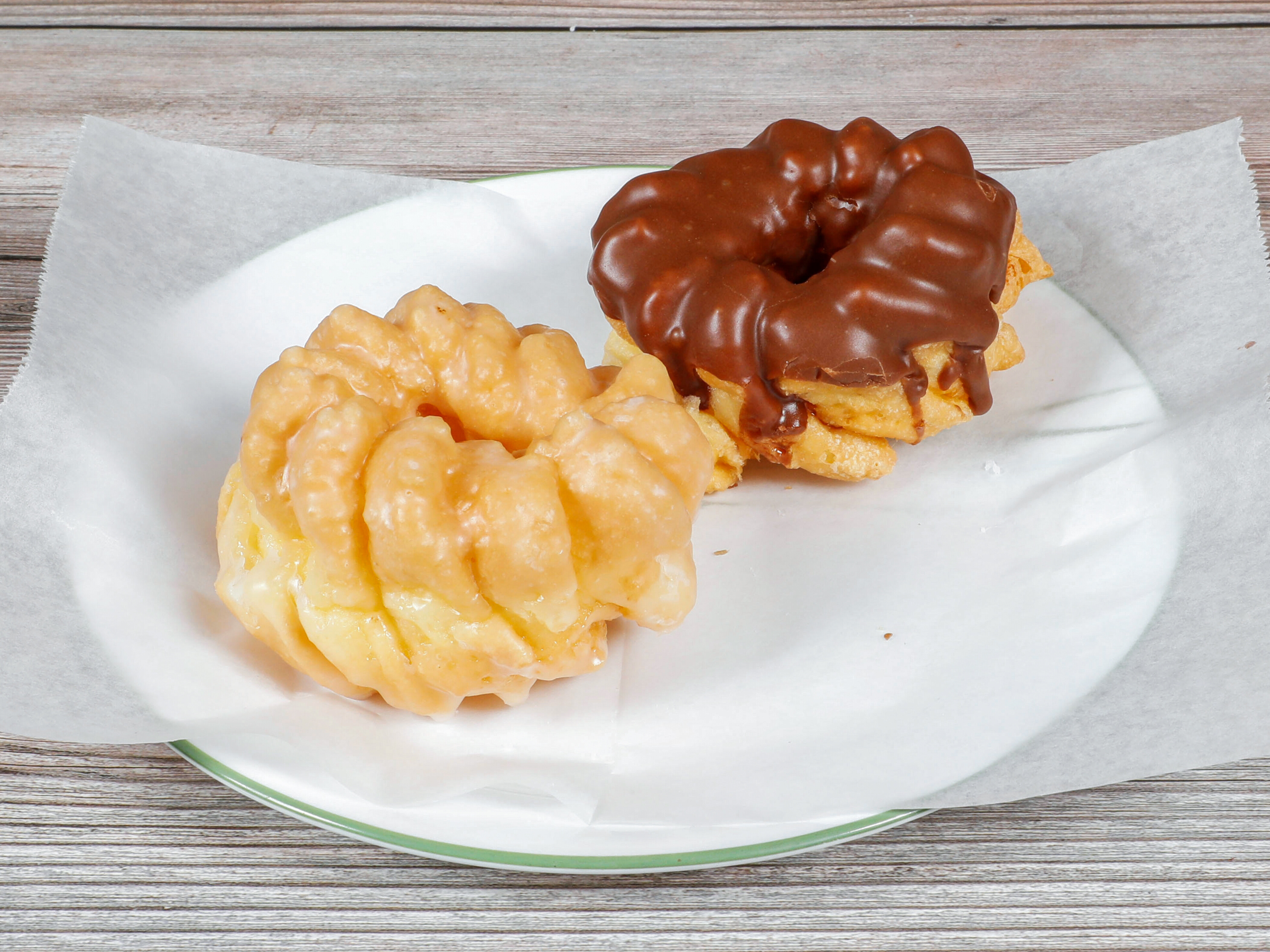 Order French Cruller Glazed food online from Dawn Donuts store, San Jose on bringmethat.com