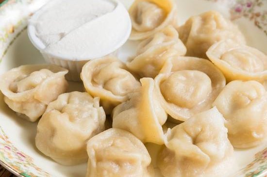 Order Pelmeni food online from 12 chairs store, New York on bringmethat.com