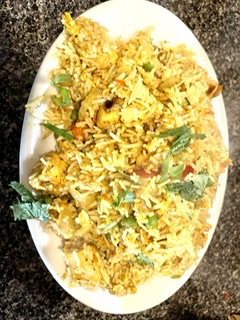 Order  Chicken Biryani + MANGO LASSI food online from India Quality Restaurant store, Boston on bringmethat.com