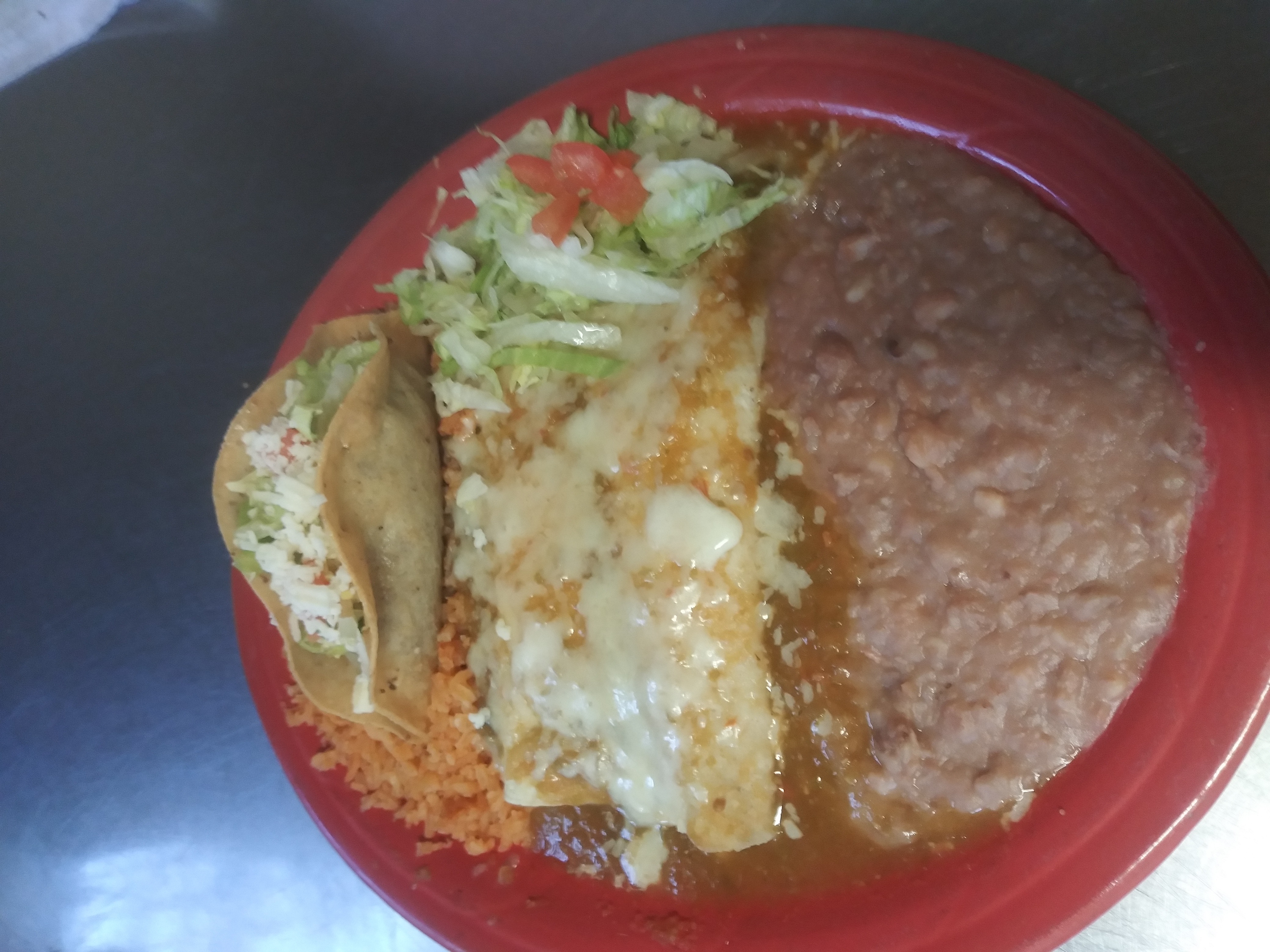 Order 1. 1 Taco and 2 Cheese Enchiladas food online from G and R Restaurant store, El Paso on bringmethat.com