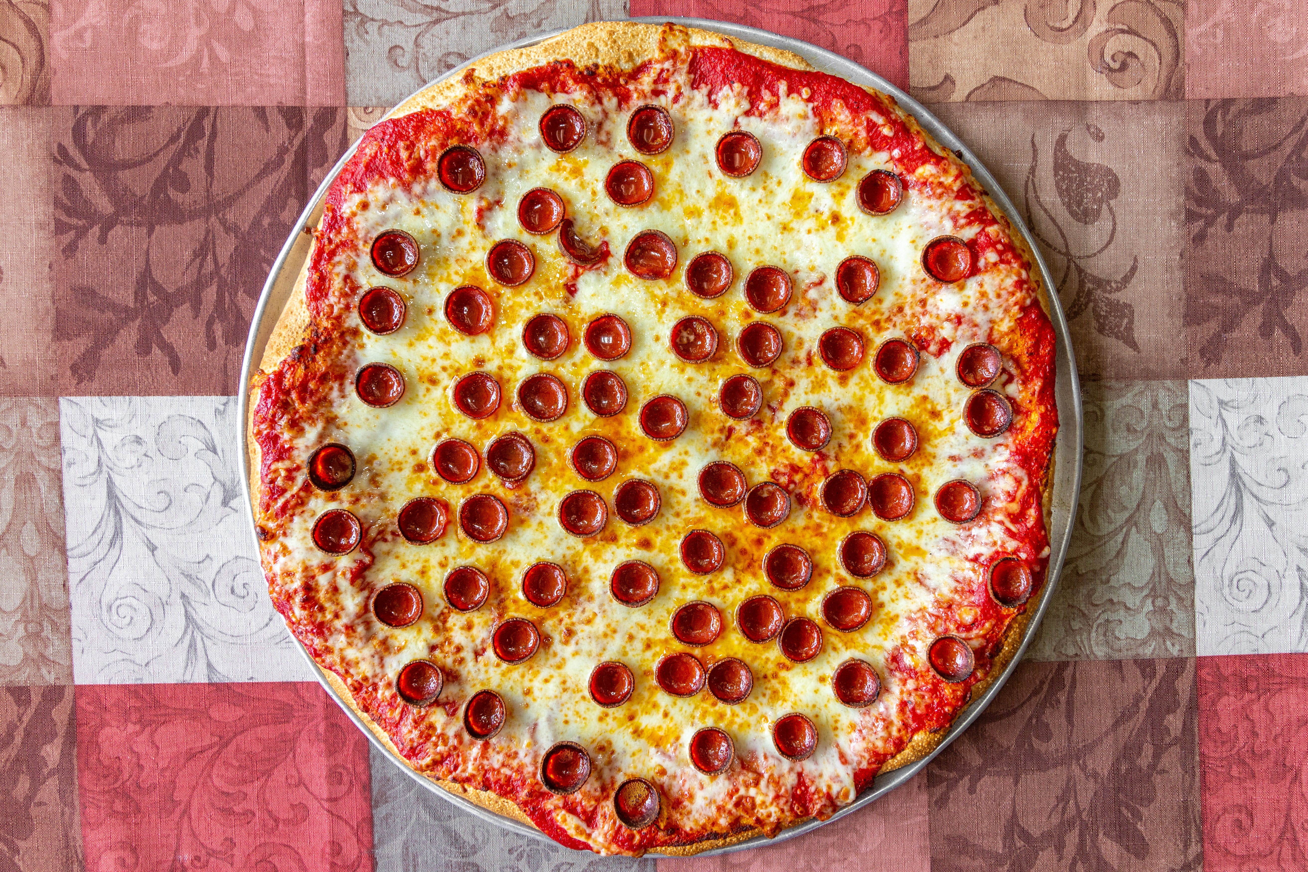 Order Cheese & Pepperoni Pizza - Solo 10'' food online from Chick-N-Pizza Works store, Buffalo on bringmethat.com