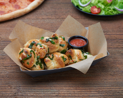 Order Garlic Knots food online from Flippin' Pizza store, Washington on bringmethat.com