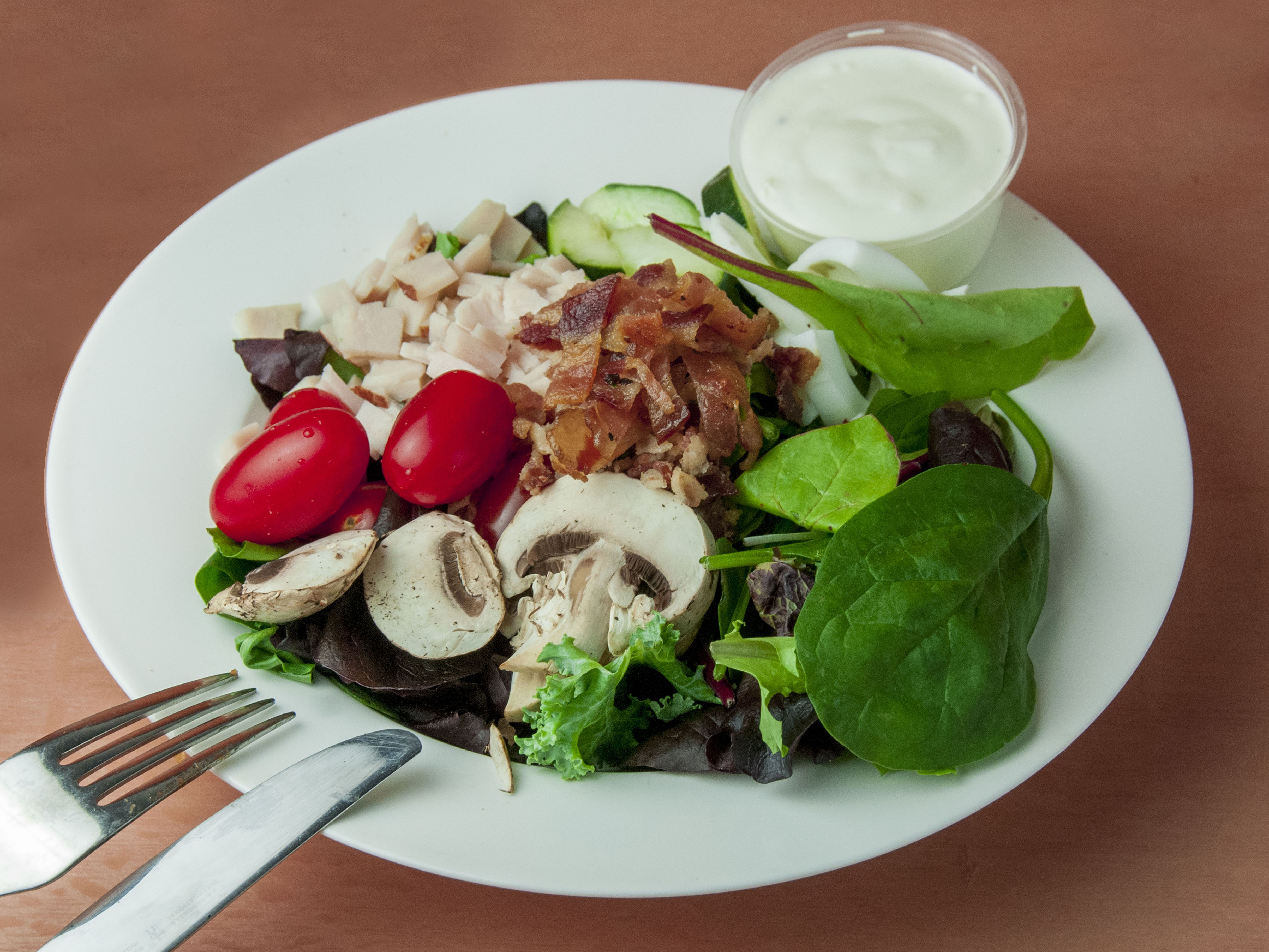 Order California Salad food online from Panini Grill store, New York on bringmethat.com
