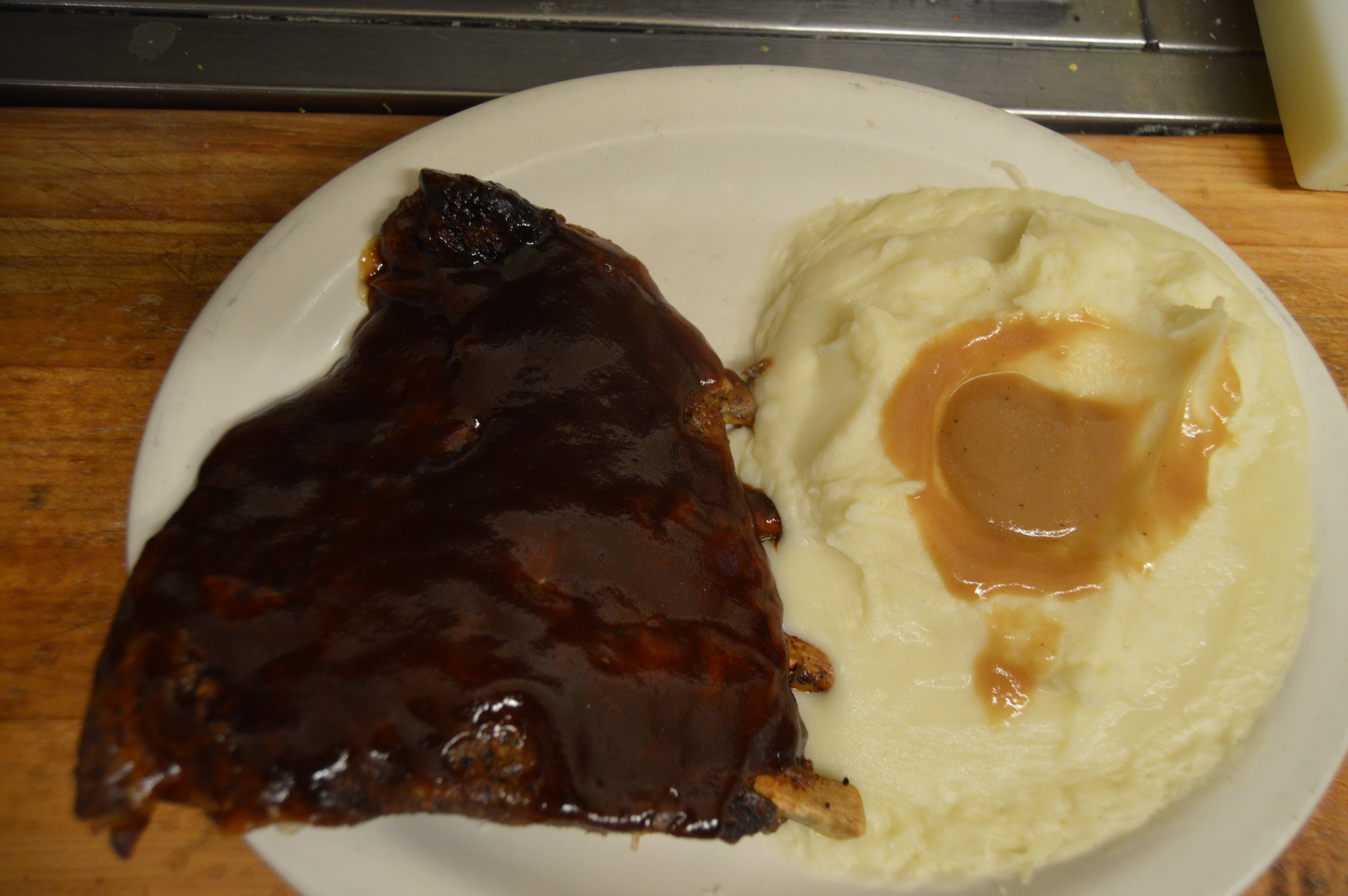Order 1/2 Slab BBQ Ribs food online from Angelas Family Restaurant store, Cleveland on bringmethat.com