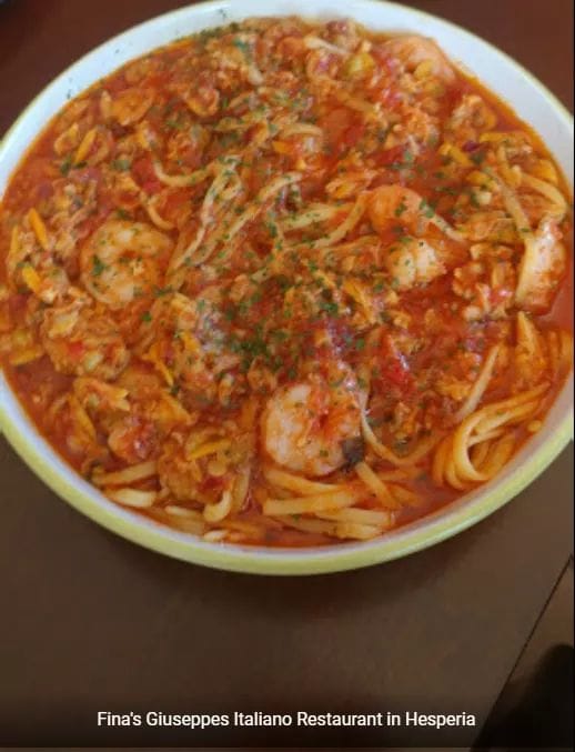 Order Seafood Arrabbiato Pasta food online from Giuseppe's Restaurant store, Victorville on bringmethat.com