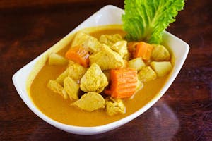 Order Yellow Curry Chicken food online from Indochine store, Palo Alto on bringmethat.com