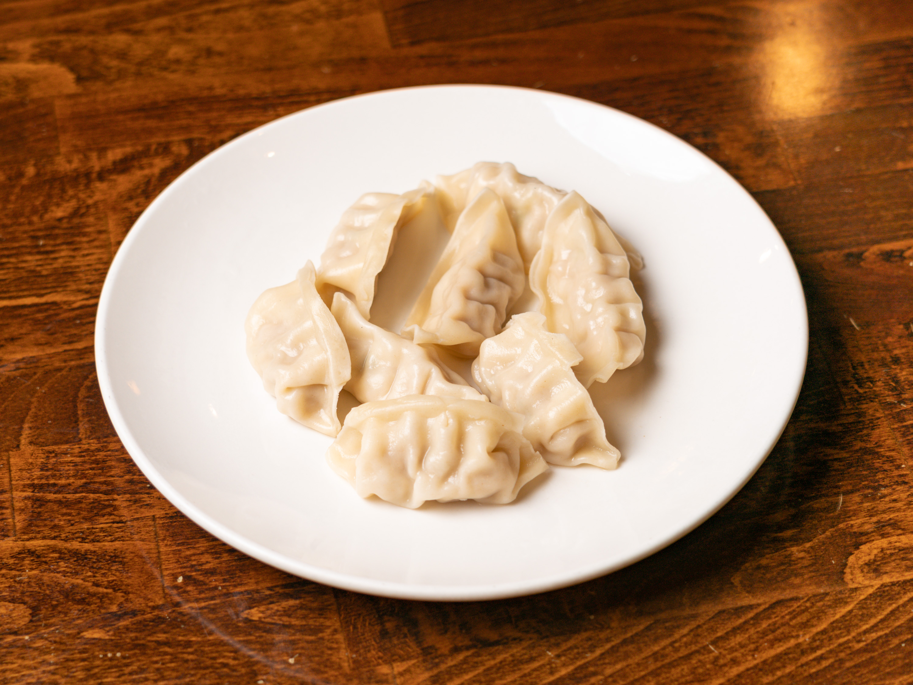 Order 16. Eight Pieces Steamed Dumplings food online from Peking Ii store, Chesapeake on bringmethat.com