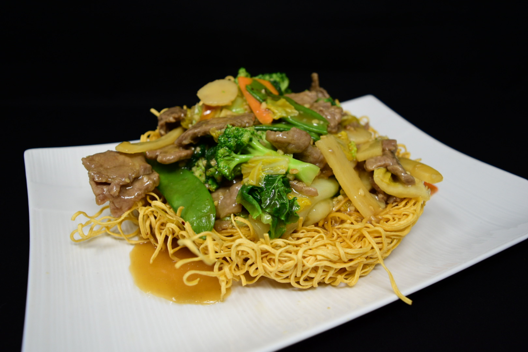 Order 99. Mi Xao Don Bo/Beef Pan Fried Noodle food online from Fortune Star Cuisine store, Reno on bringmethat.com