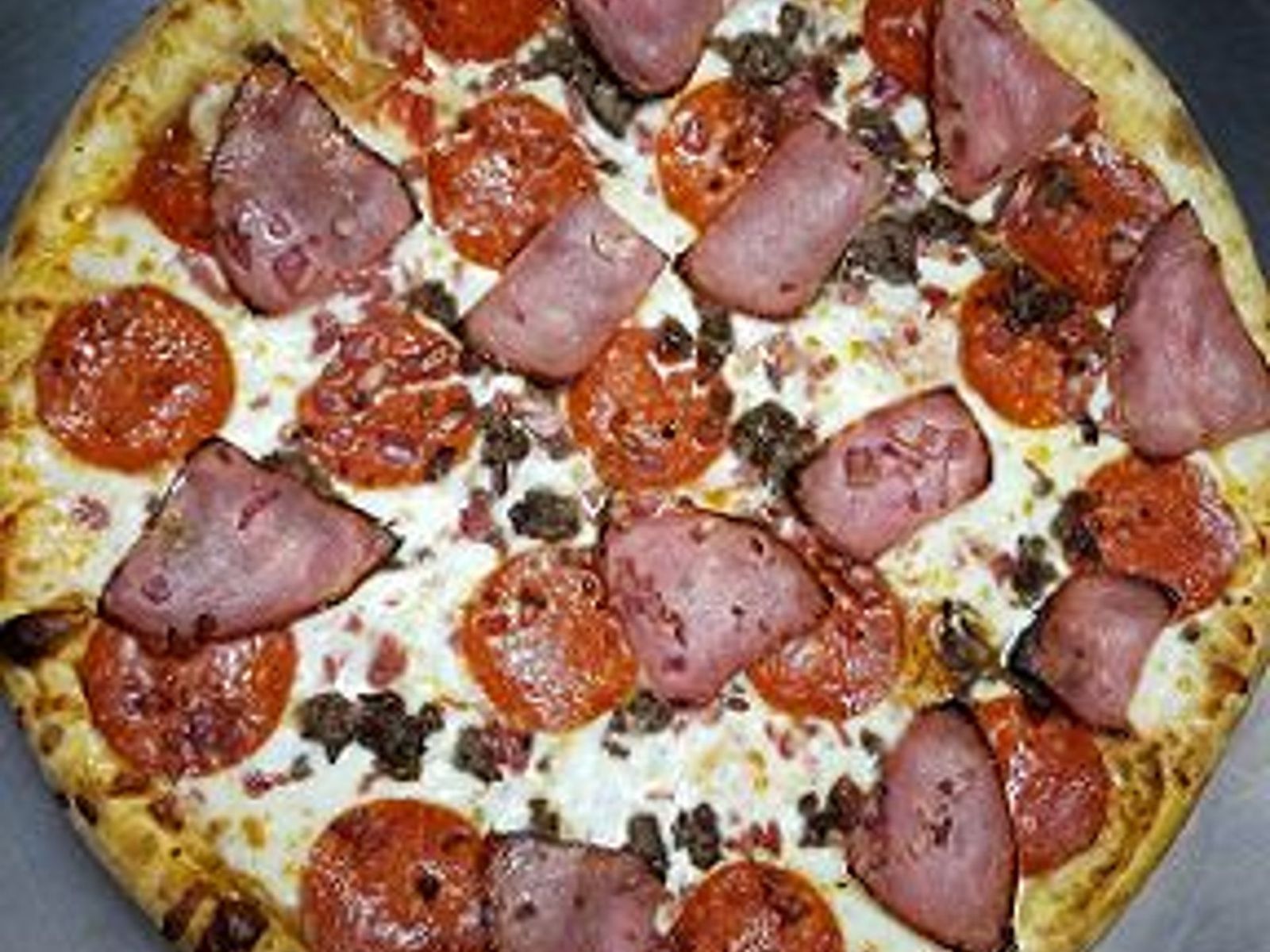 Order MEAT LOVER's food online from Clockwork Pizza store, Tempe on bringmethat.com