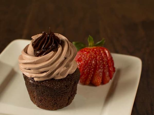 Order Ghirardelli Chocolate Bomb Cupcake food online from Home Run Inn Pizza store, Chicago on bringmethat.com