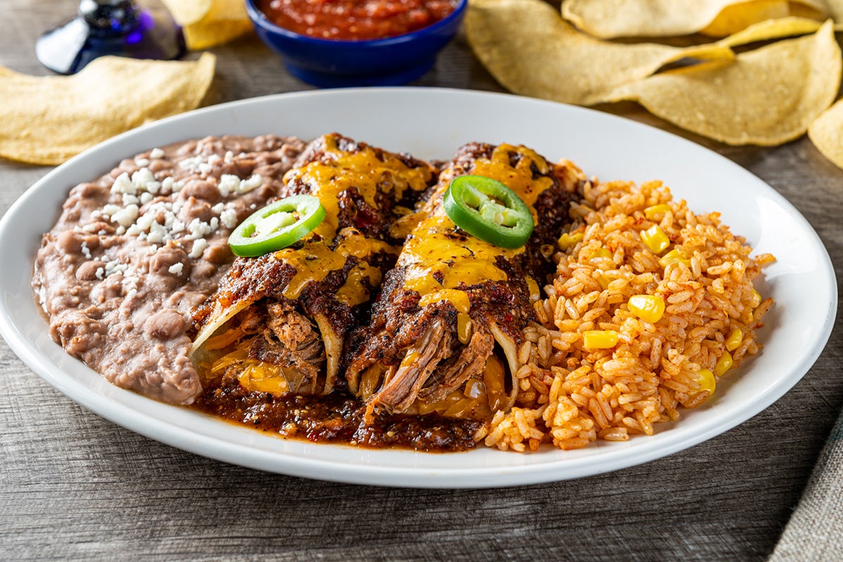 Order Barbacoa Enchiladas food online from On The Border Mexican Grill and Cantina store, Colorado Springs on bringmethat.com