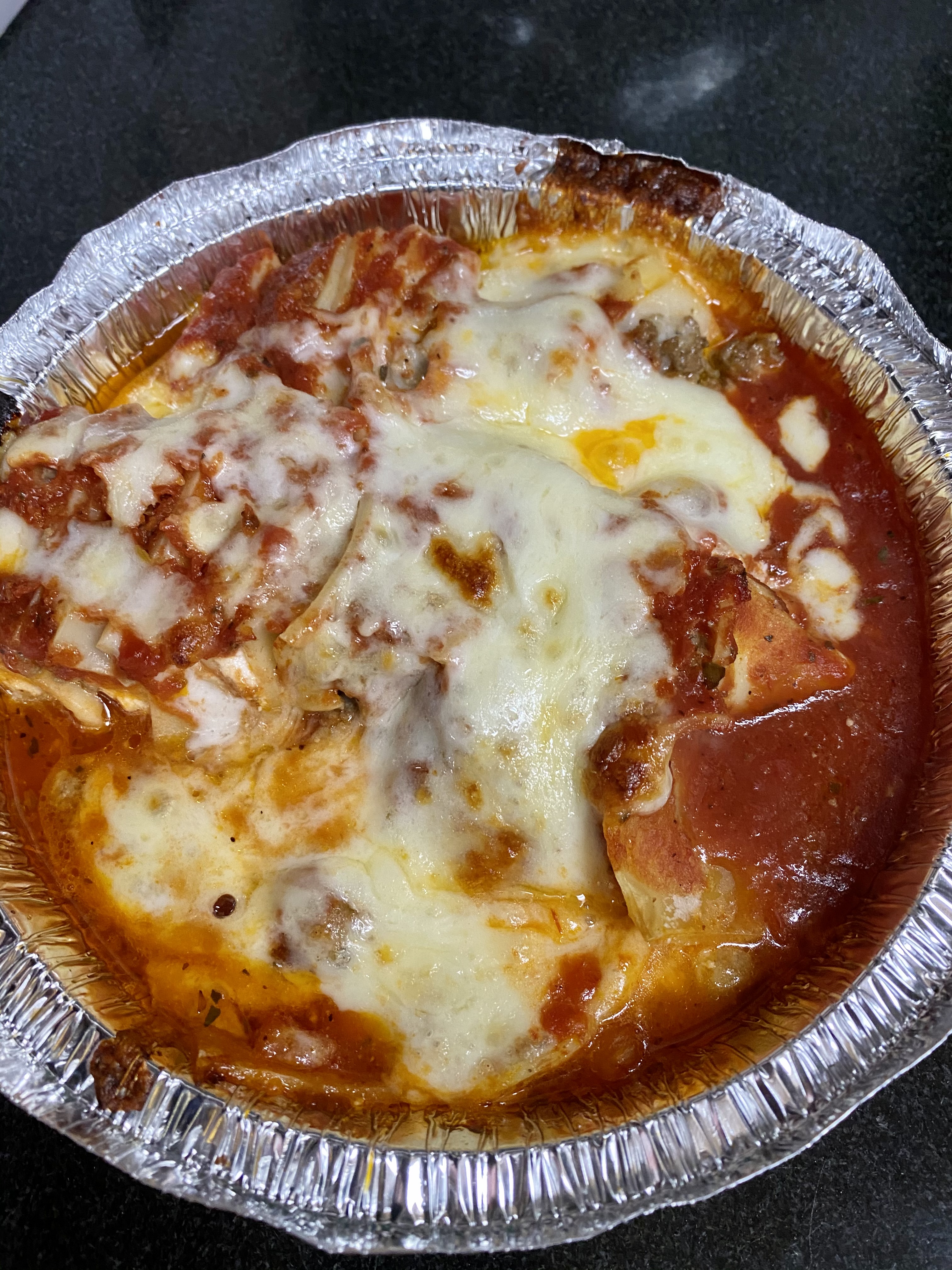 Order Home Baked Lasagna food online from Vinny's Pizzeria store, Corona on bringmethat.com