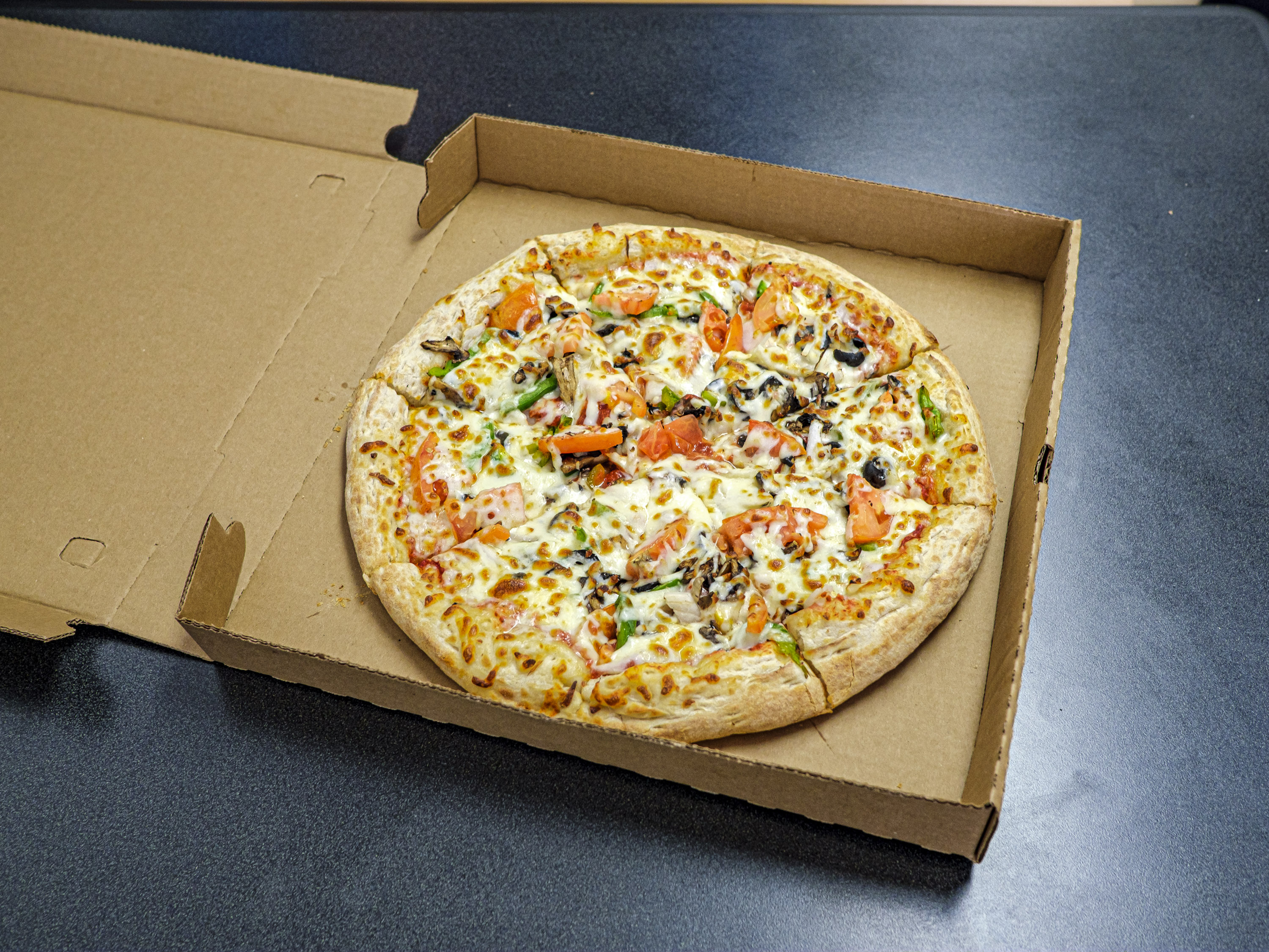 Order Veggie Delight Pizza food online from Aladdin's Kitchen store, Washington on bringmethat.com