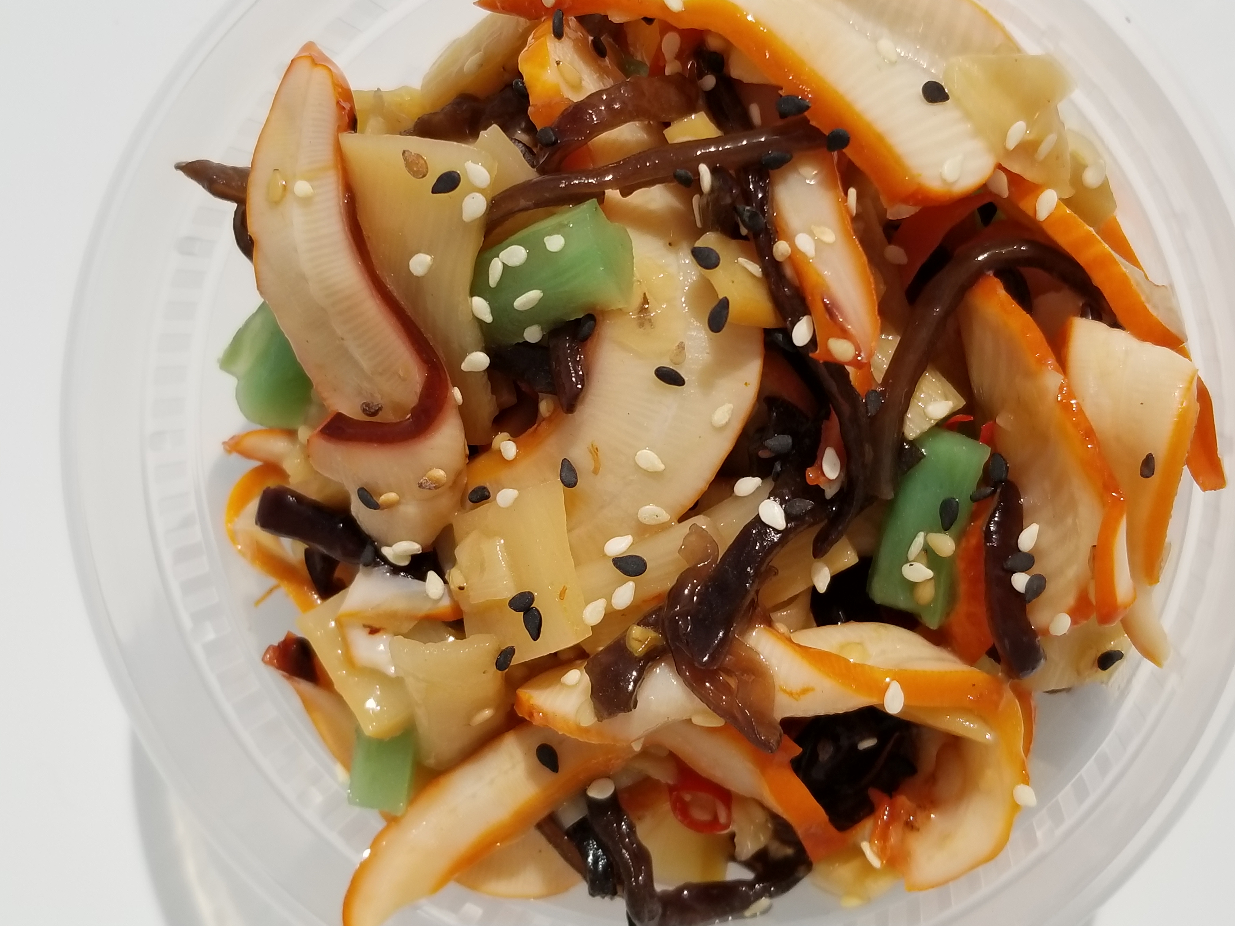 Order Squid Salad food online from Po-K Loco store, Denton on bringmethat.com