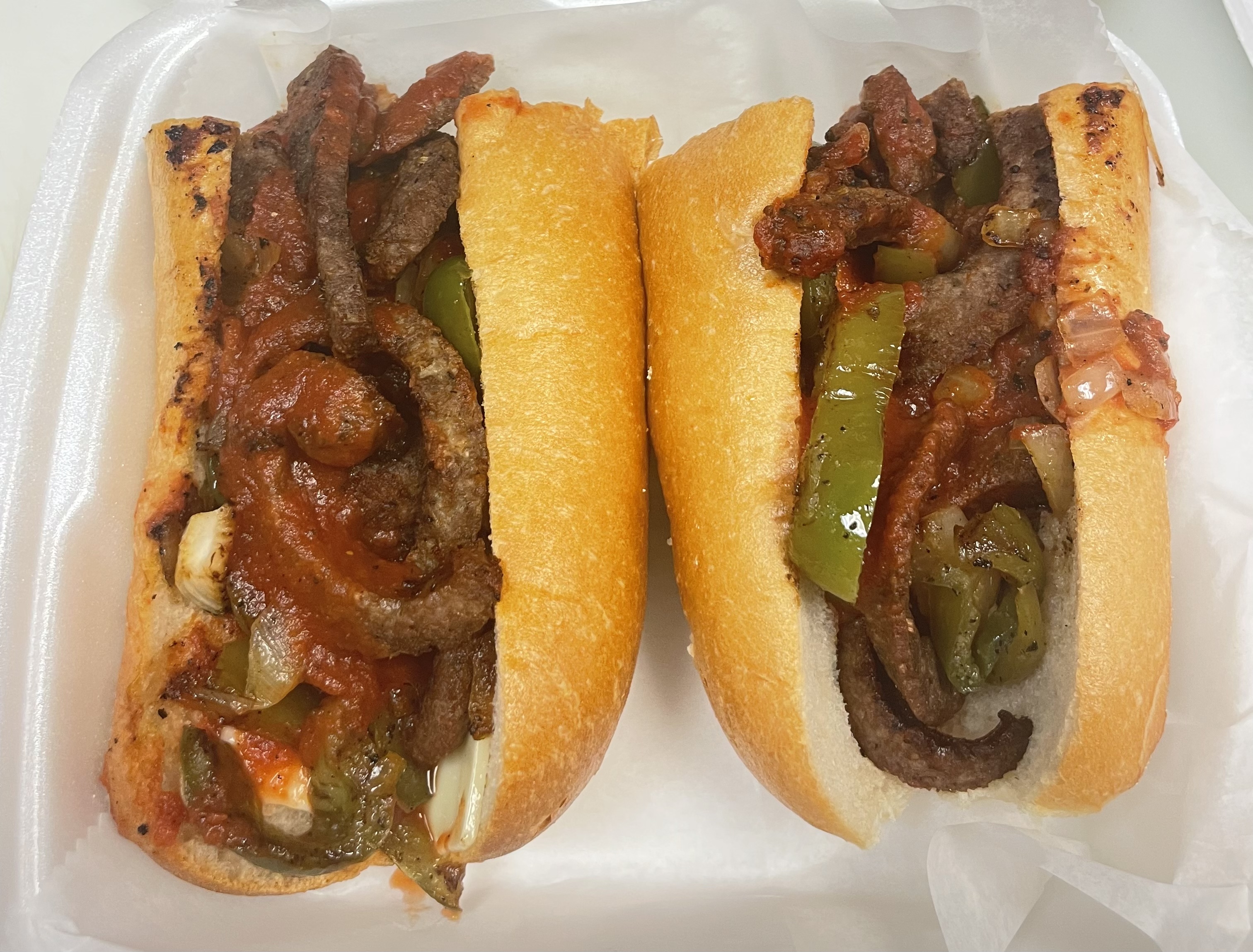 Order Sausage, Green Peppers and Onions Sandwich food online from Dolce carini pizza store, Philadelphia on bringmethat.com
