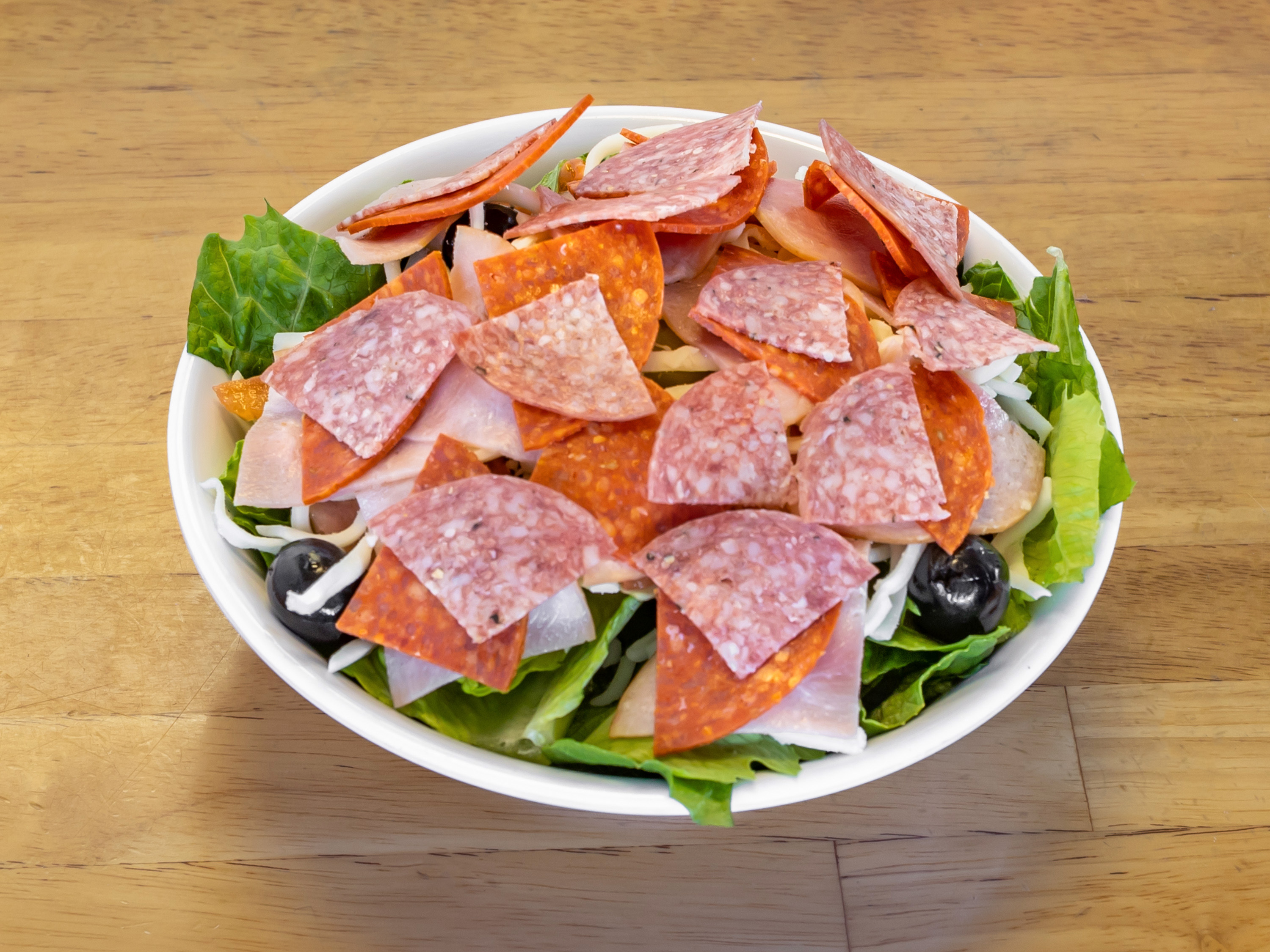 Order Antipasto Salad food online from Zeppo Pizza store, Bakersfield on bringmethat.com