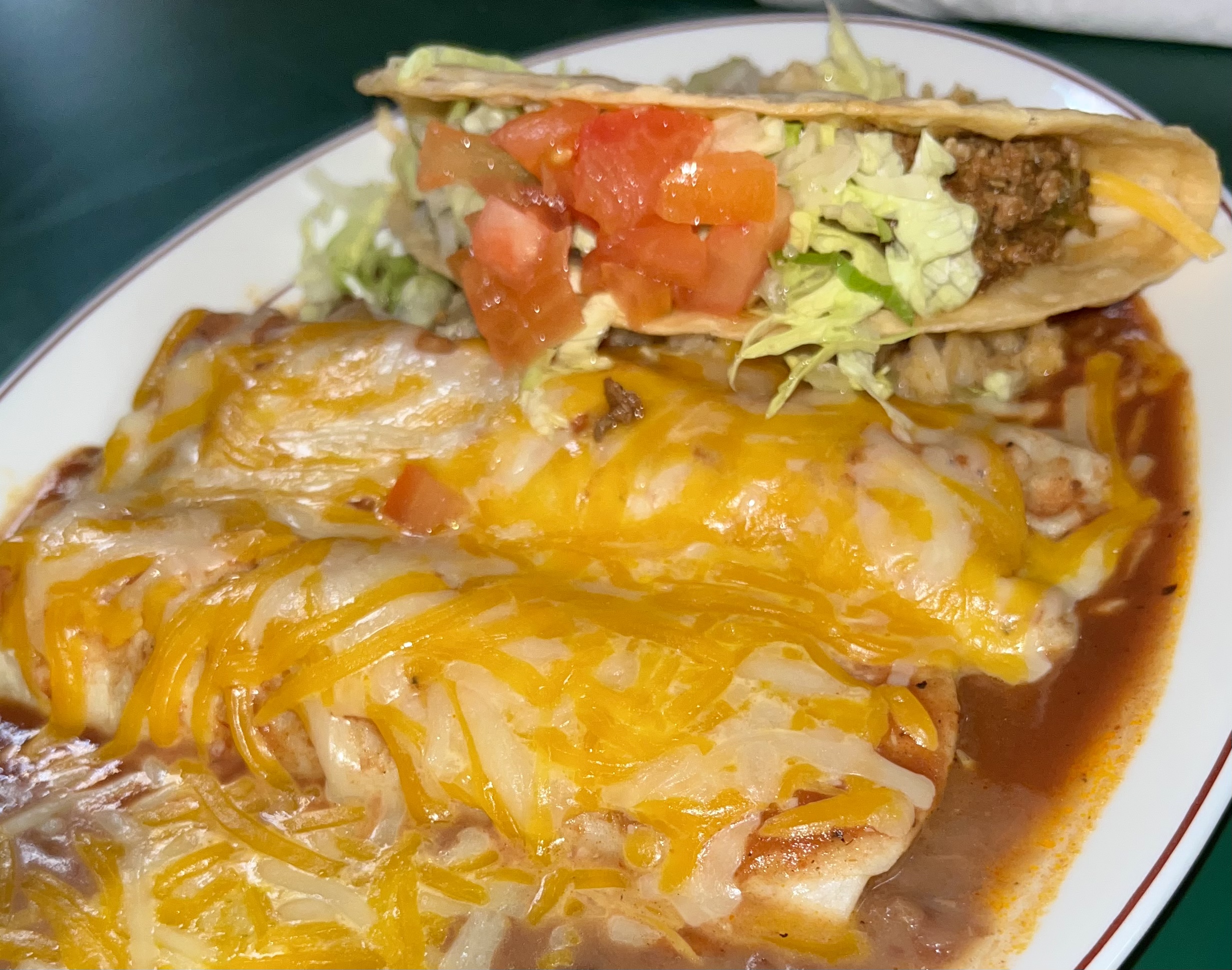 Order Taco and 2 Enchiladas Comida Tradicional food online from El Alamo store, Omaha on bringmethat.com