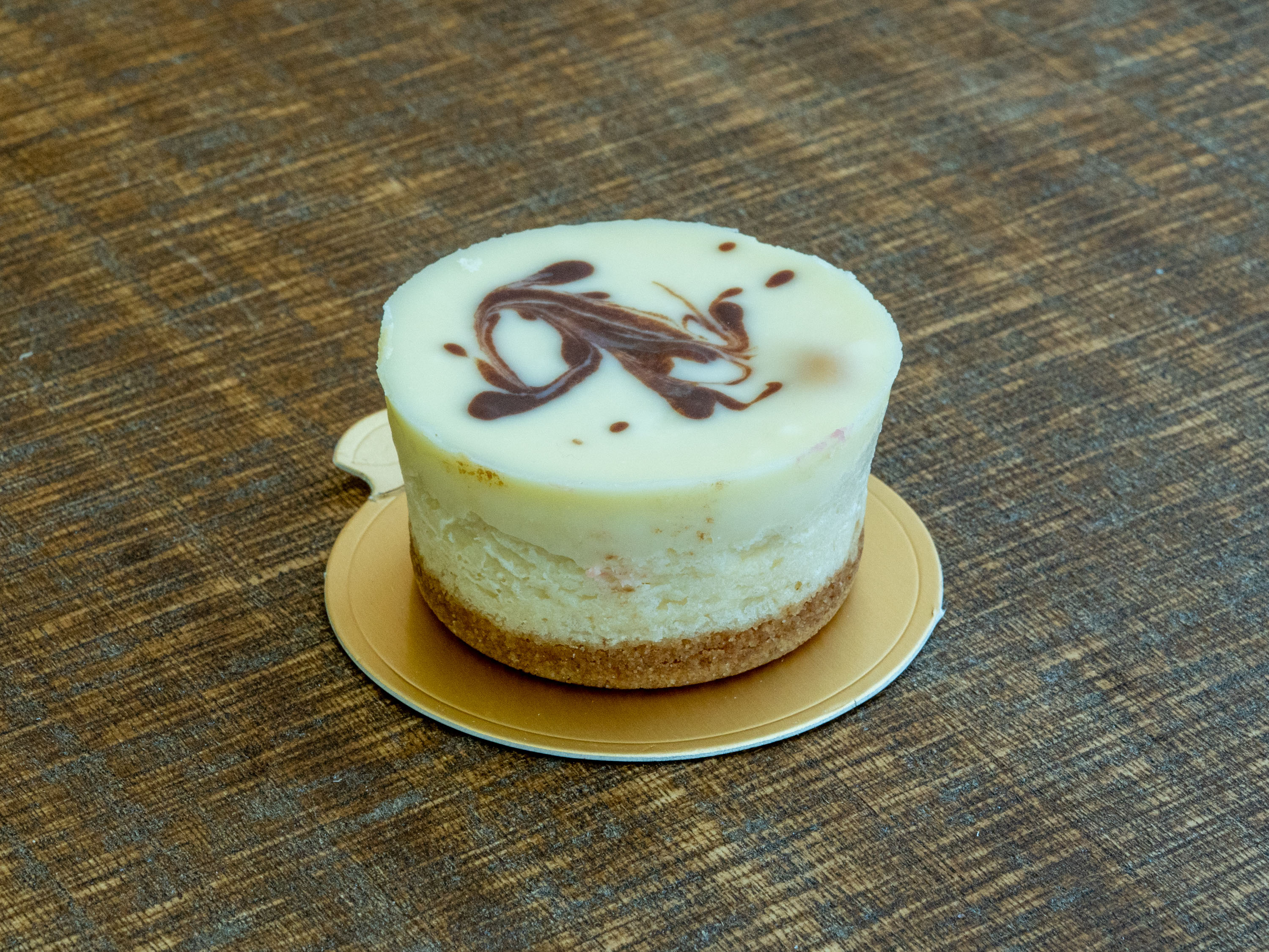 Order 21. New York Cheesecake Cupcake food online from Dessert European Bakery store, Modesto on bringmethat.com