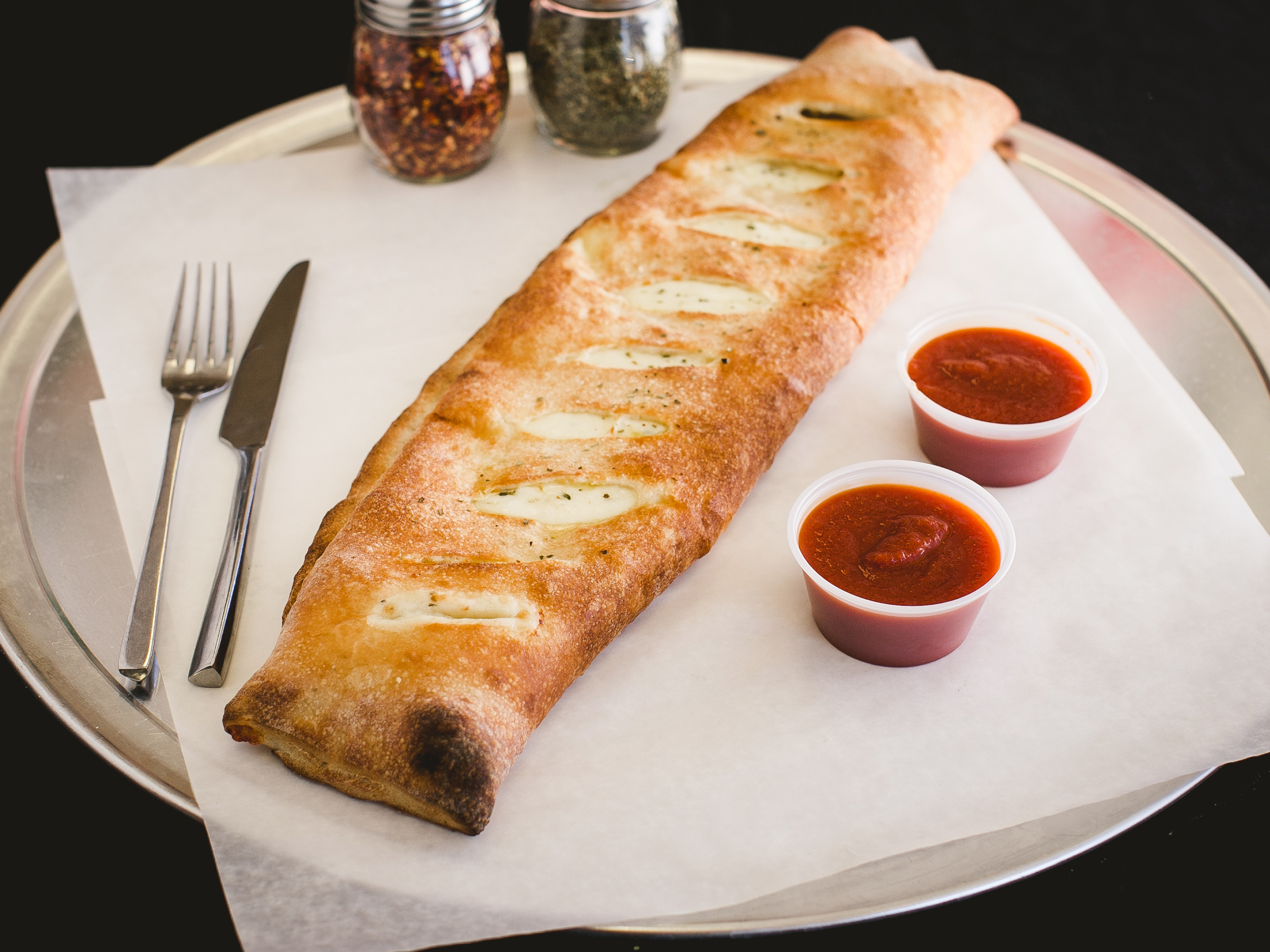 Order Vegetable Stromboli food online from Tonitos Pizza store, West Chester on bringmethat.com