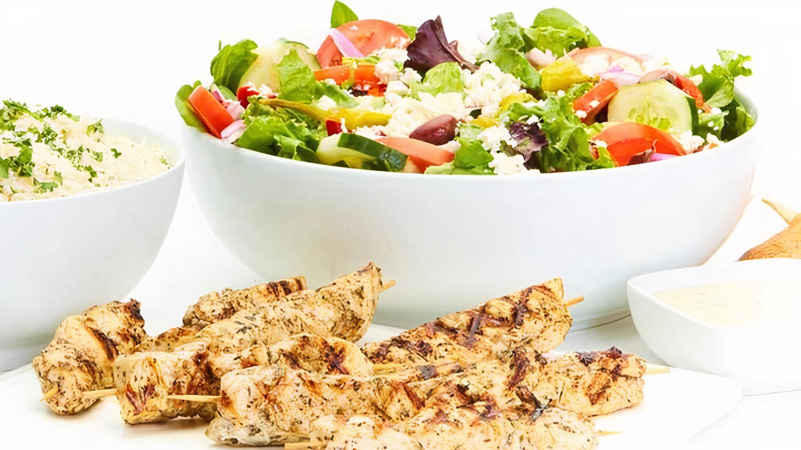 Order Grilled Chicken Kebob Family Feast for 4 food online from Taziki Mediterranean Cafe store, Alpharetta on bringmethat.com