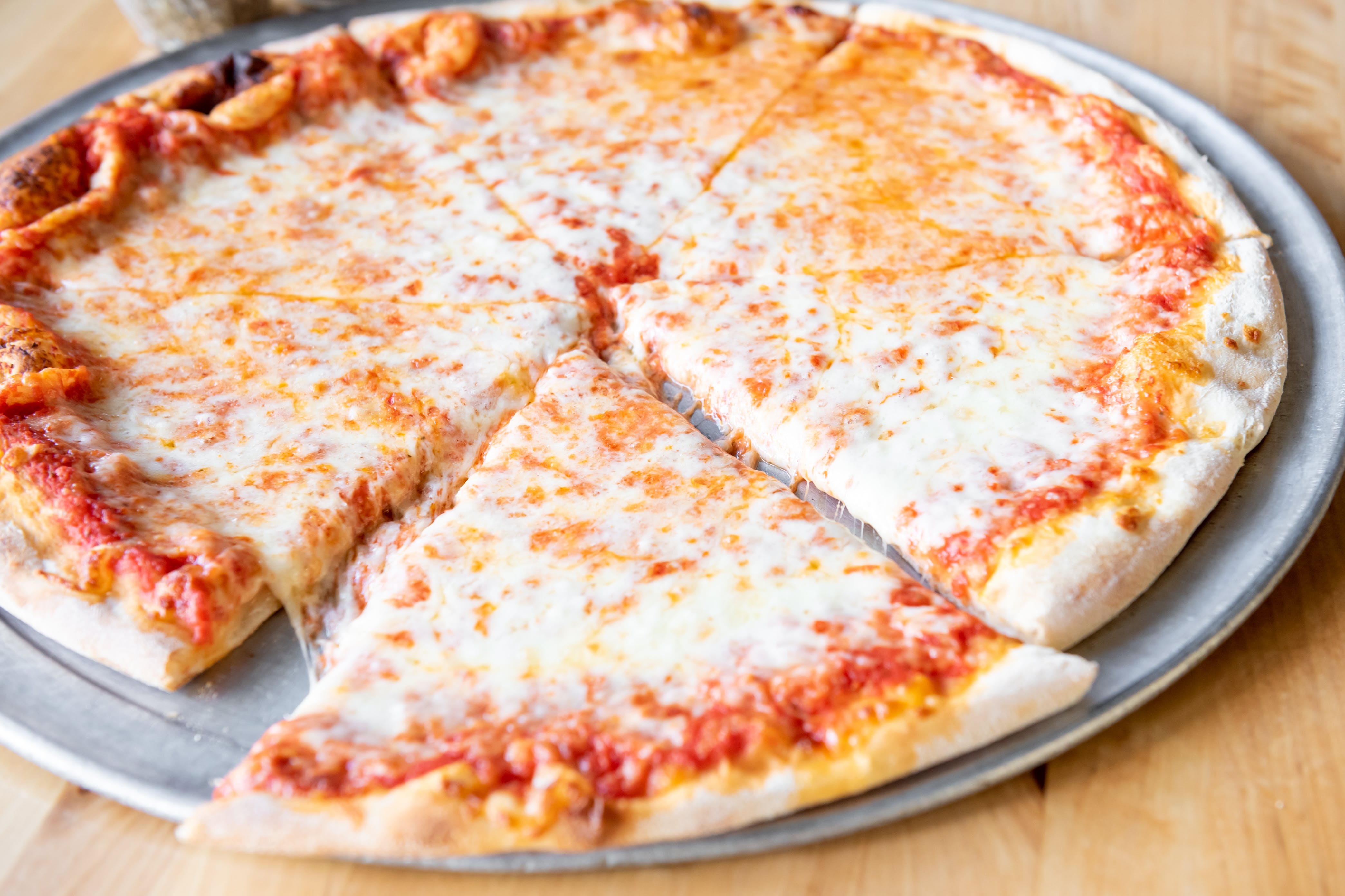 Order Cheese Pizza Slice - Slice food online from Italy's Restaurant & Pizzeria store, Phillipsburg on bringmethat.com