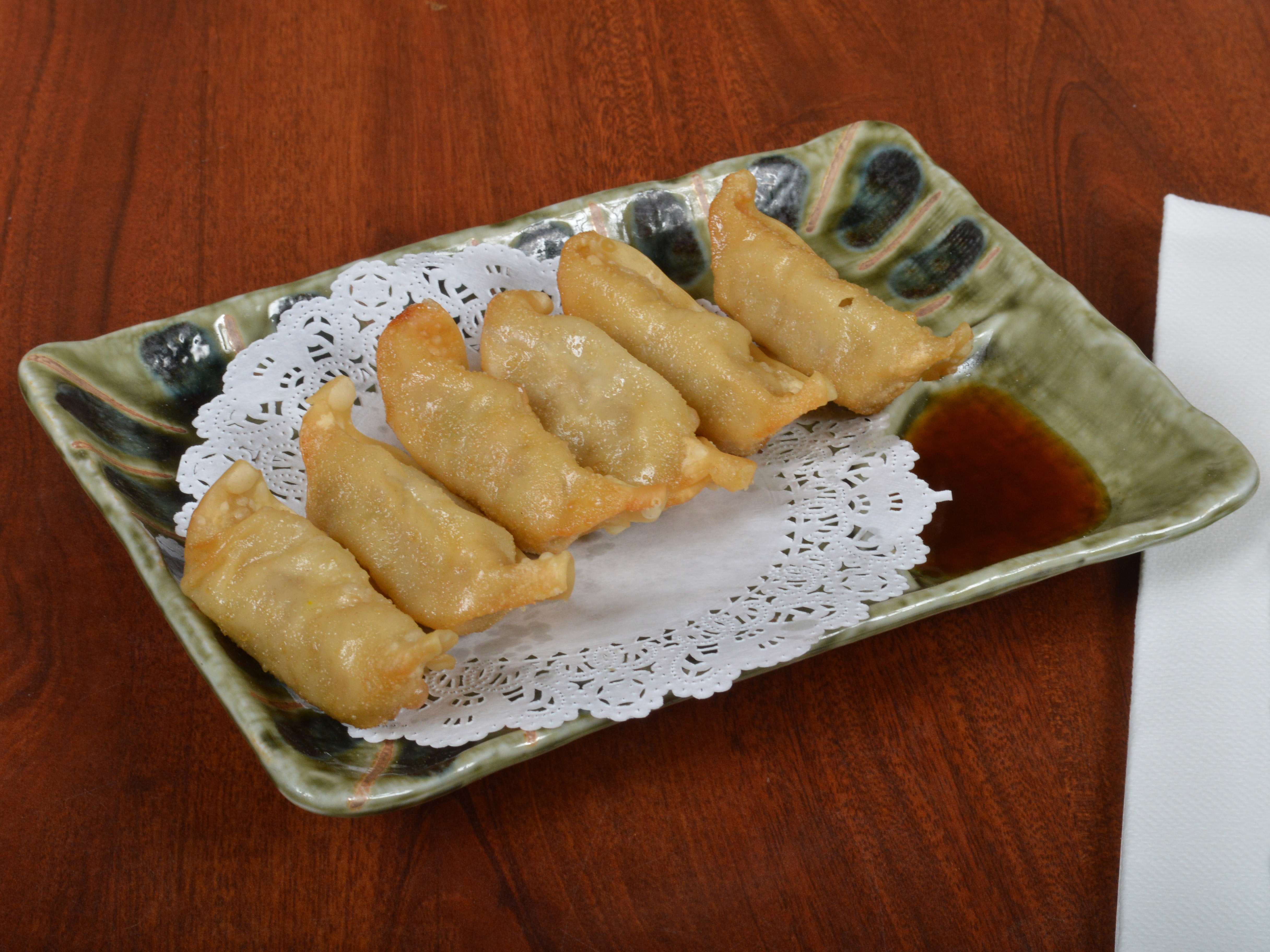 Order Gyoza food online from Sushi Palace store, Great Neck on bringmethat.com