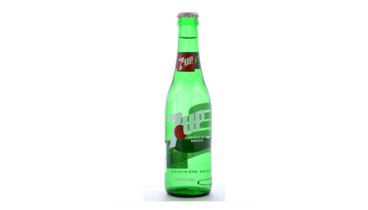 Order Mexican 7UP 12oz Bottle food online from Foodland Liquor store, Santa Ana on bringmethat.com