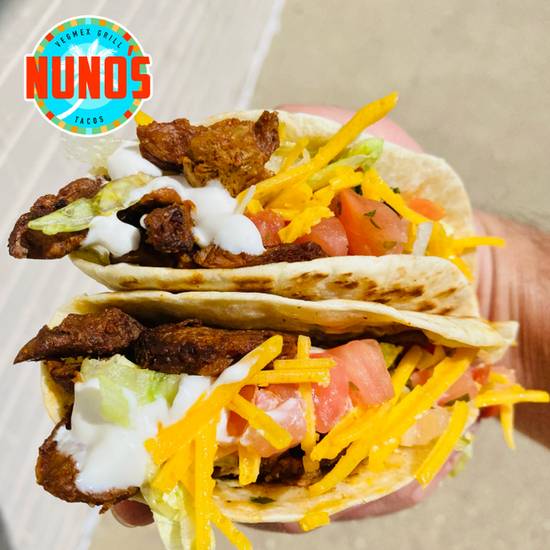 Order STEAK TACOS 2ct food online from Nuno's Tacos & Vegmex Grill store, Dallas on bringmethat.com