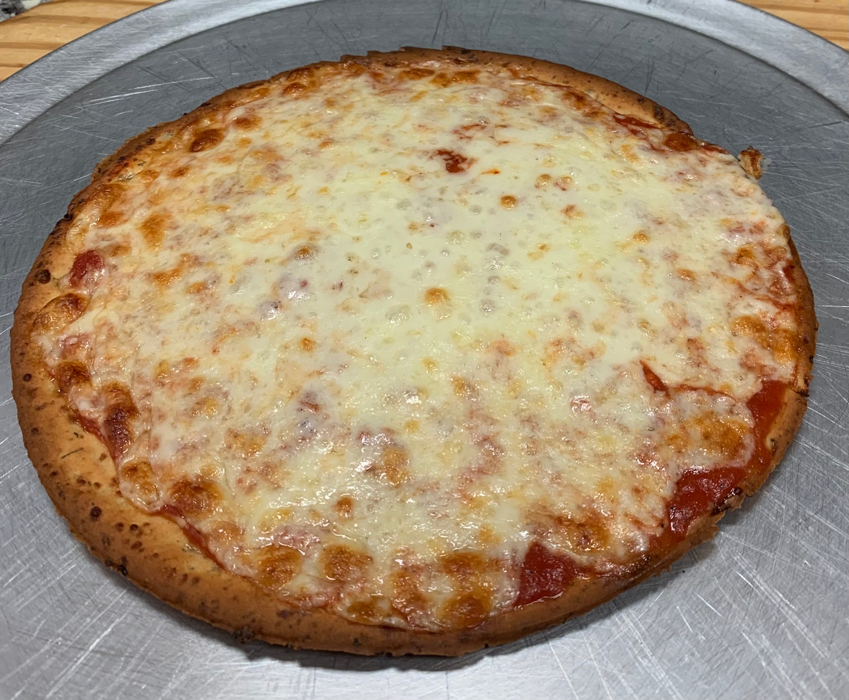 Order Gluten Free Cauliflower Cheese Pizza - 10" food online from Lorenzo's Pizza store, Fountain Hill on bringmethat.com