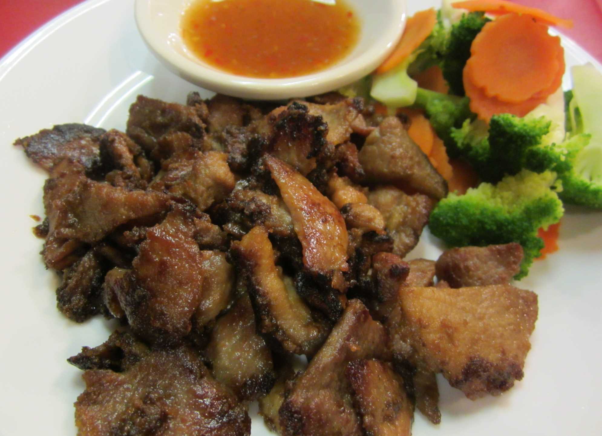 Order Grilled Marinated Pork food online from Bangkok Express store, Cincinnati on bringmethat.com
