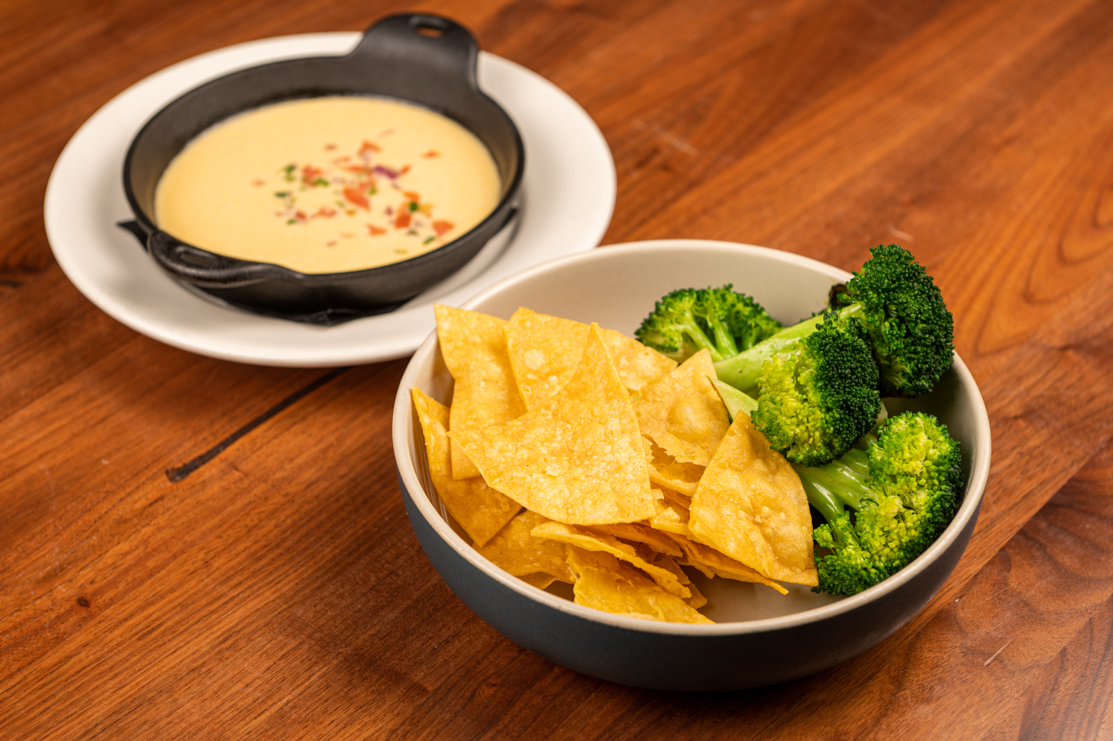 Order Queso Dip W/ Broccoli and Chips food online from Westwood store, San Francisco on bringmethat.com