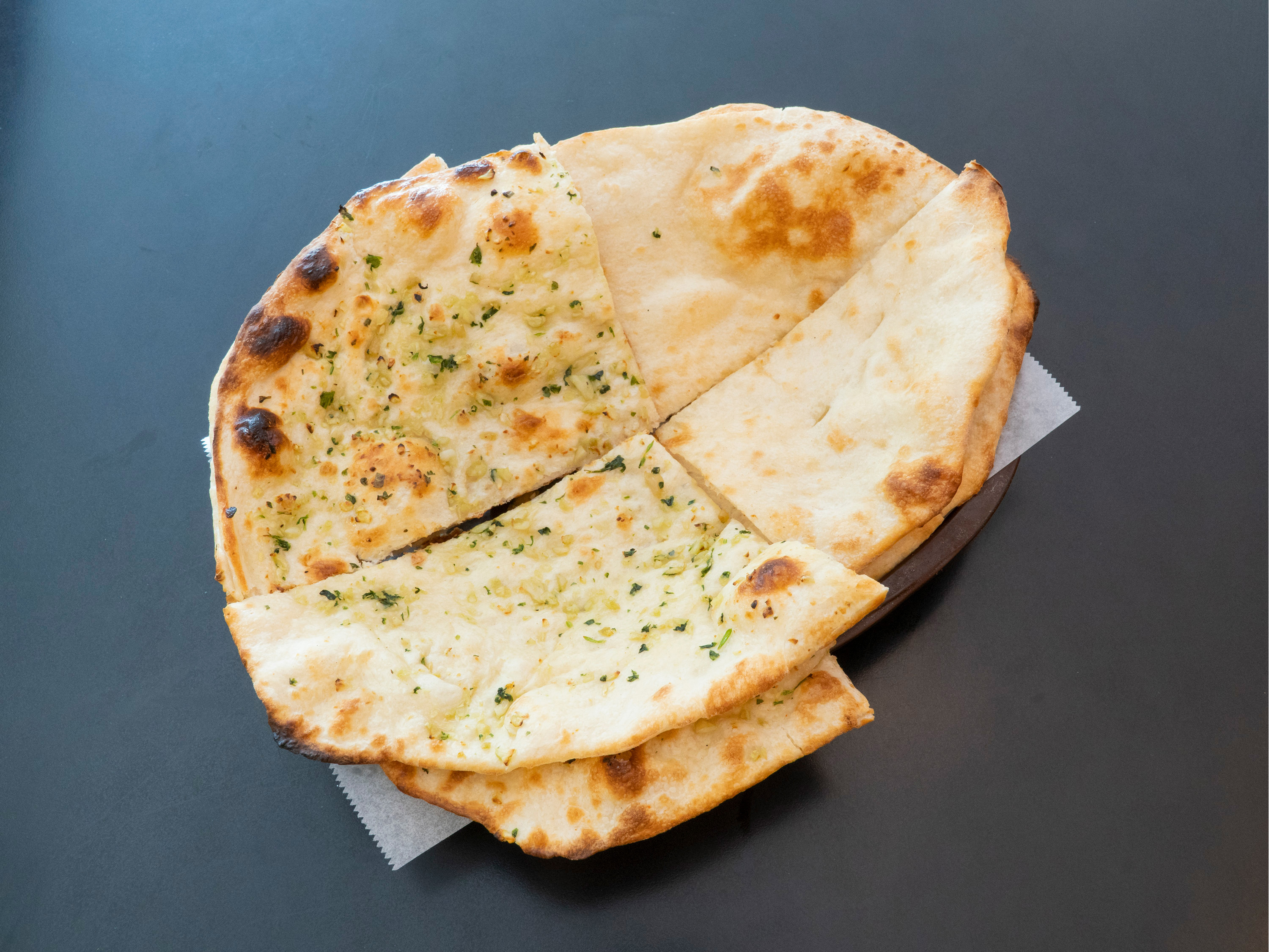 Order Plain Naan food online from Dhaba Indian Cuisine store, Tracy on bringmethat.com