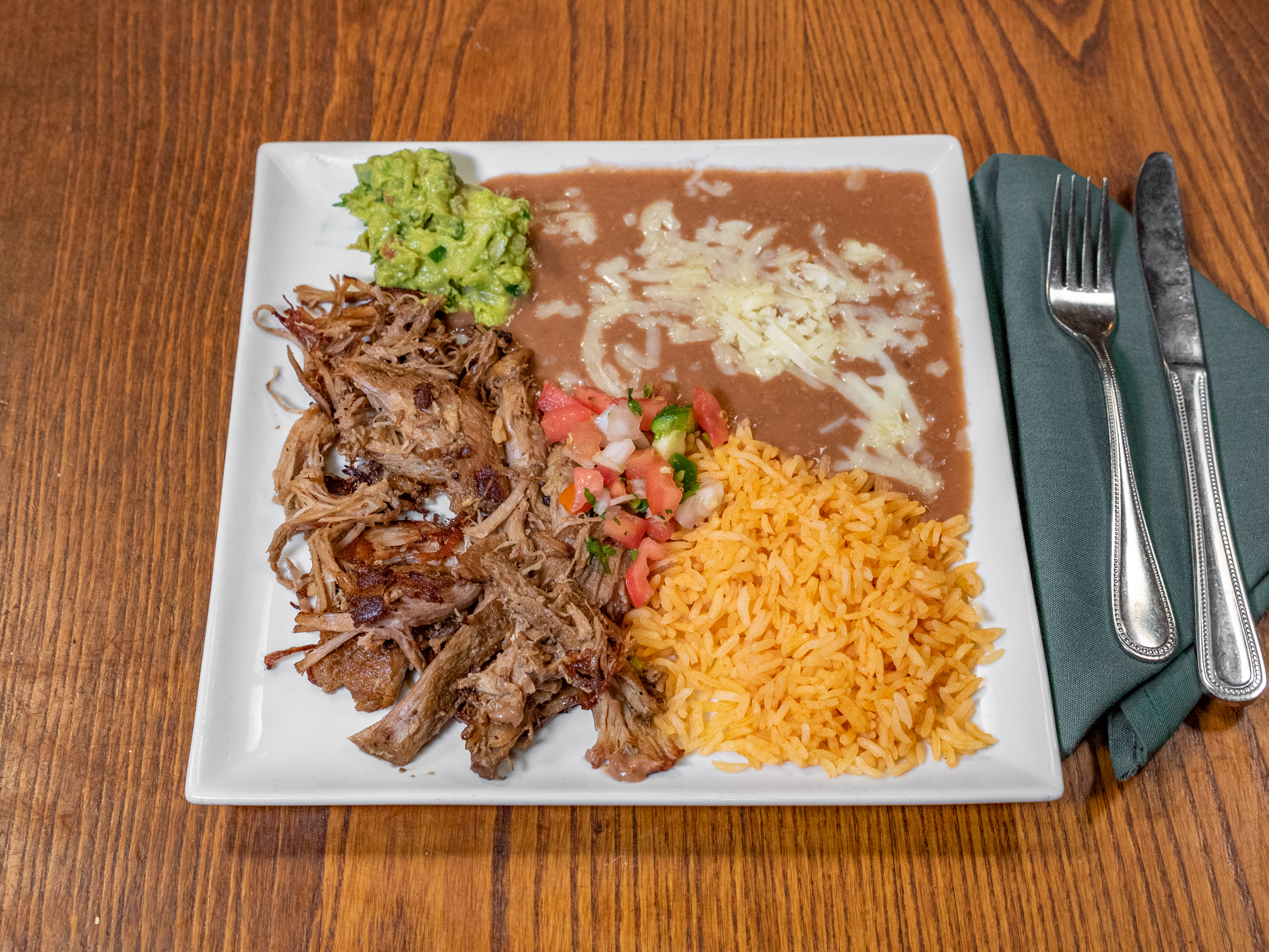 Order Carnitas Plate food online from East Patio Mexicano store, Sacramento on bringmethat.com