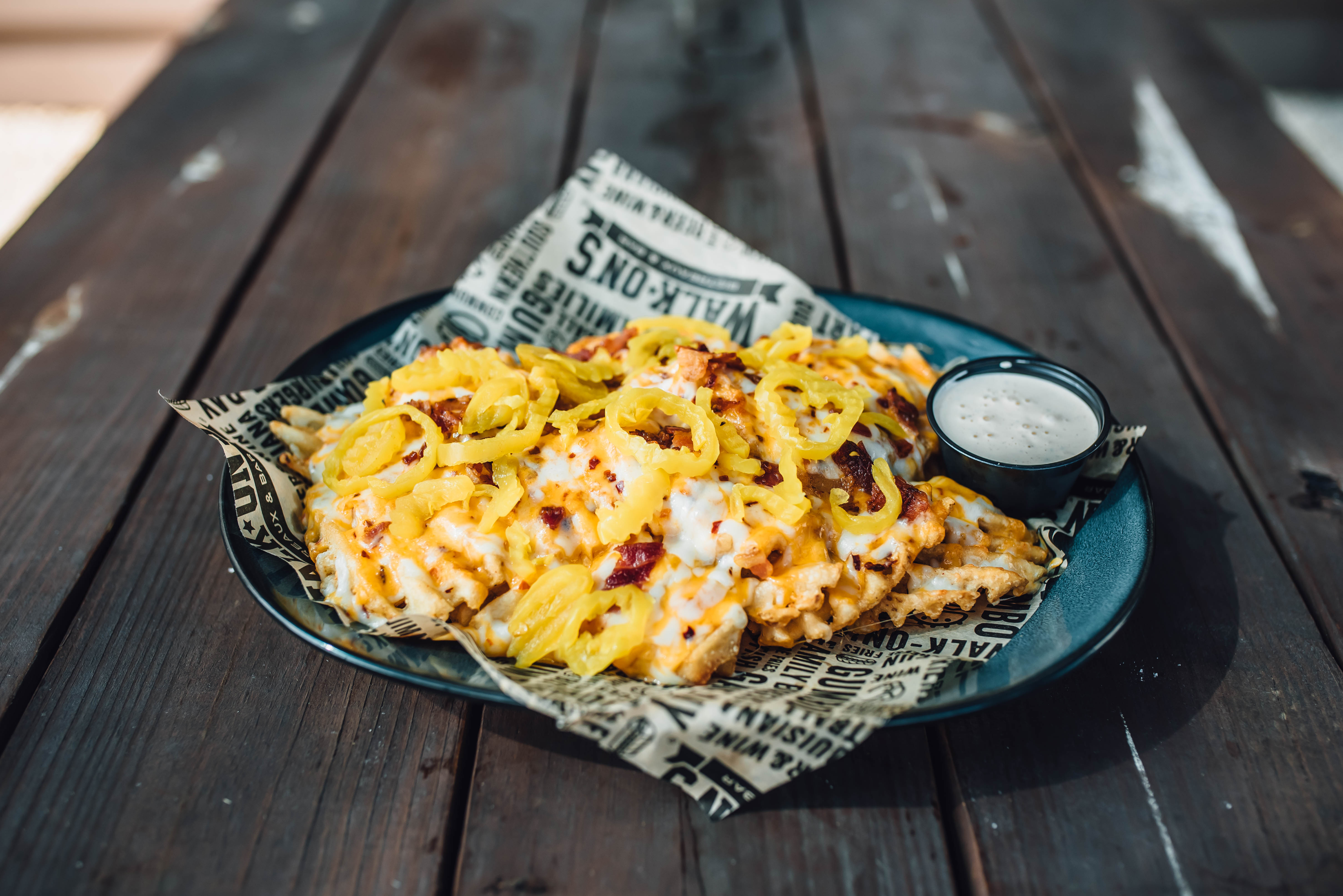 Order Waffle Cheese Fries food online from Walk-On's Bistreaux & Bar - Waco store, Woodway on bringmethat.com