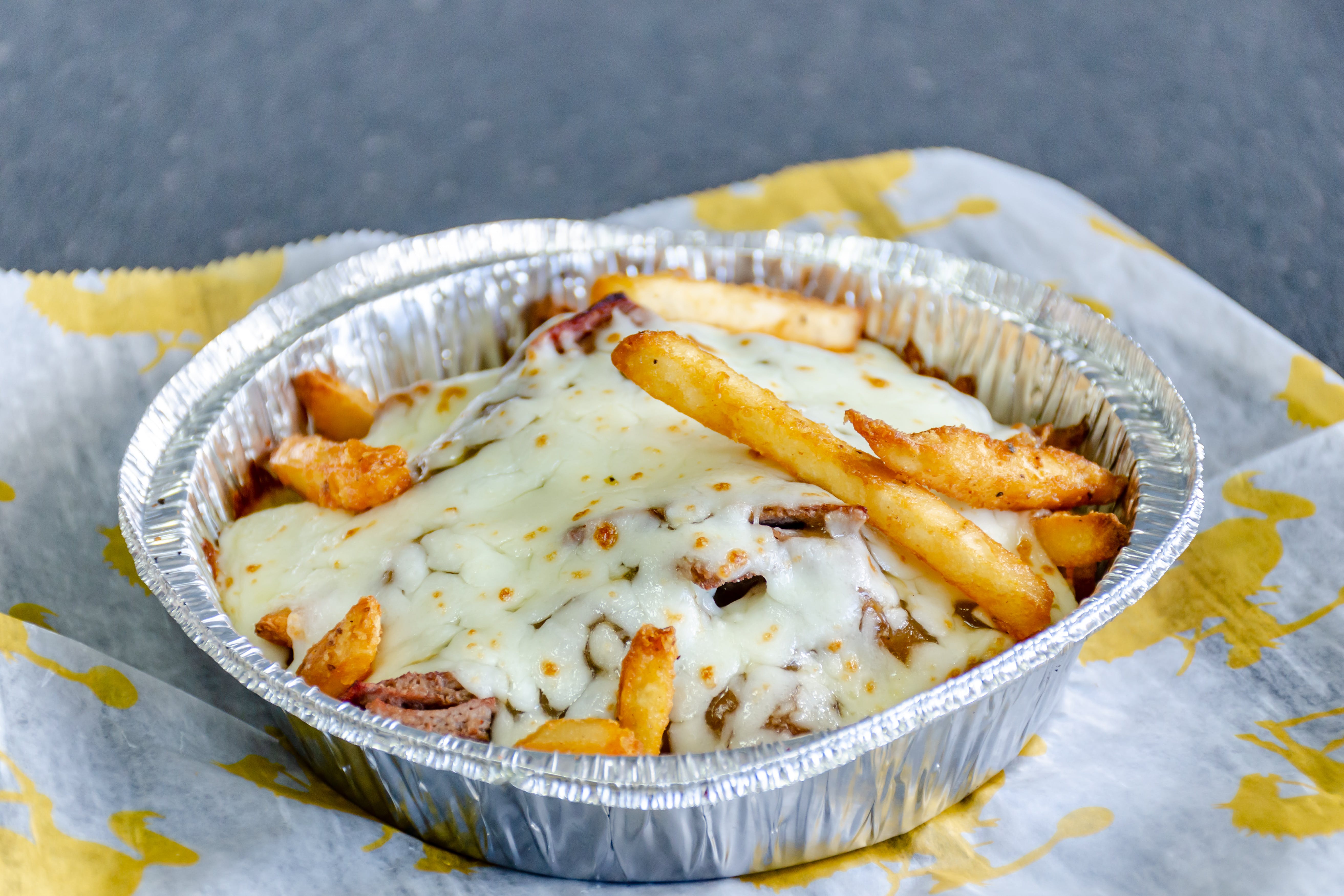 Order Cowboy Fries - Appetizer food online from Hometown Locker Room Pizza & Sub store, St Marys on bringmethat.com
