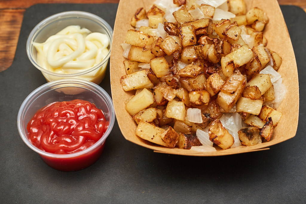 Order Roasted Potatoes food online from Berlin Currywurst store, New York on bringmethat.com