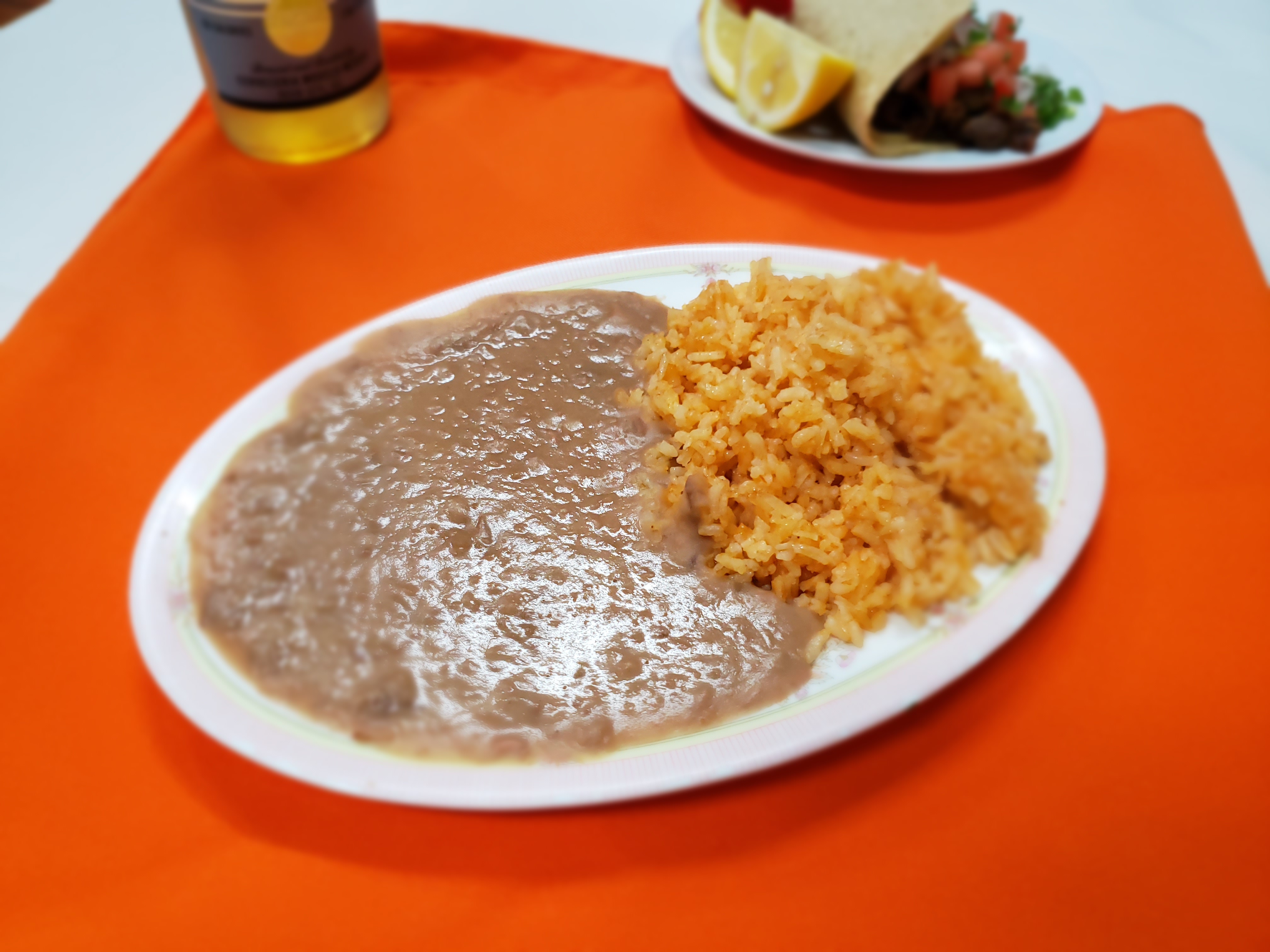 Order XL Rice or Beans food online from El Parian Restaurant store, Los Angeles on bringmethat.com