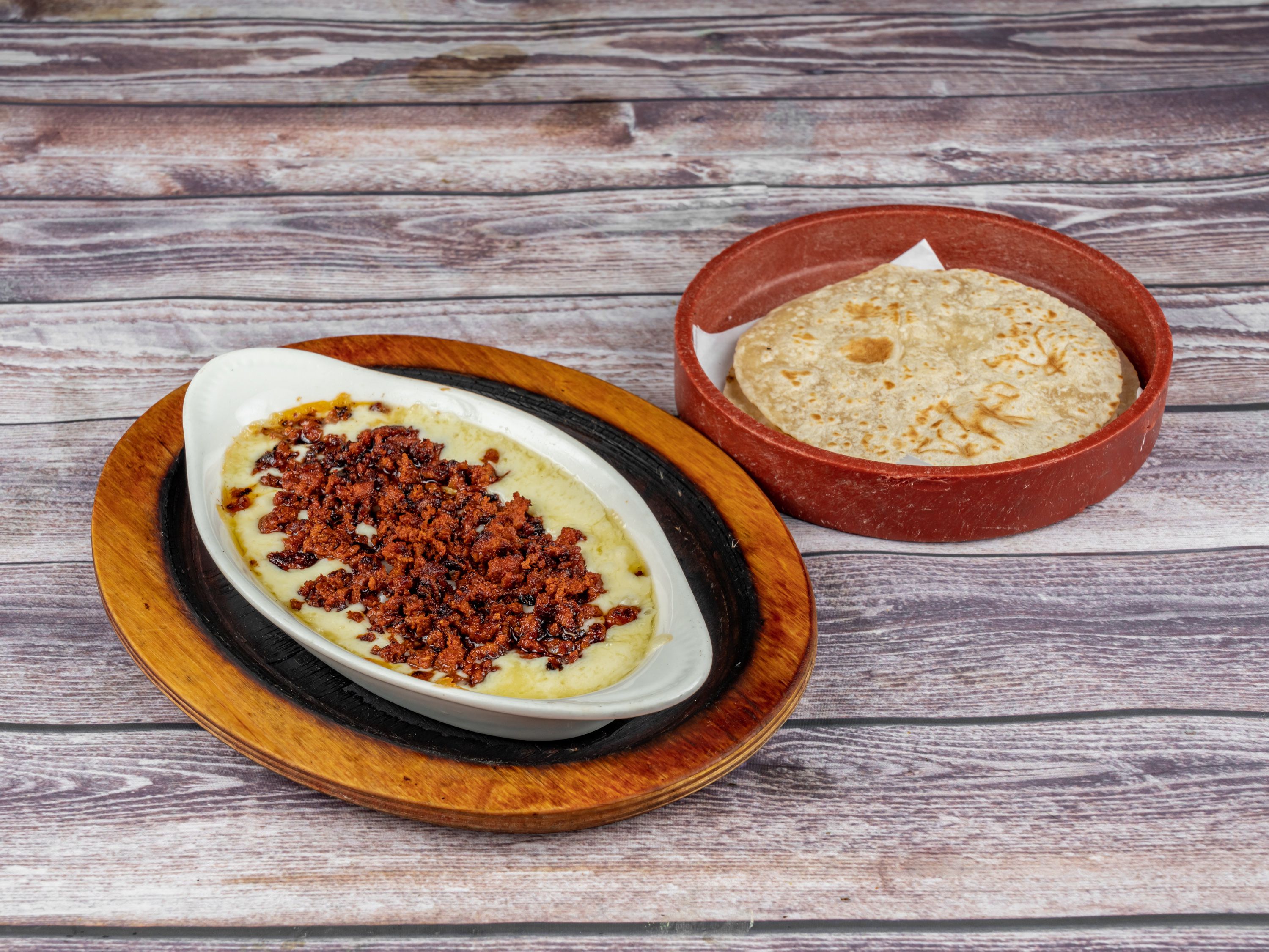 Order Queso Flameado food online from Tequila Lopez Mexican Restaurant store, Houston on bringmethat.com