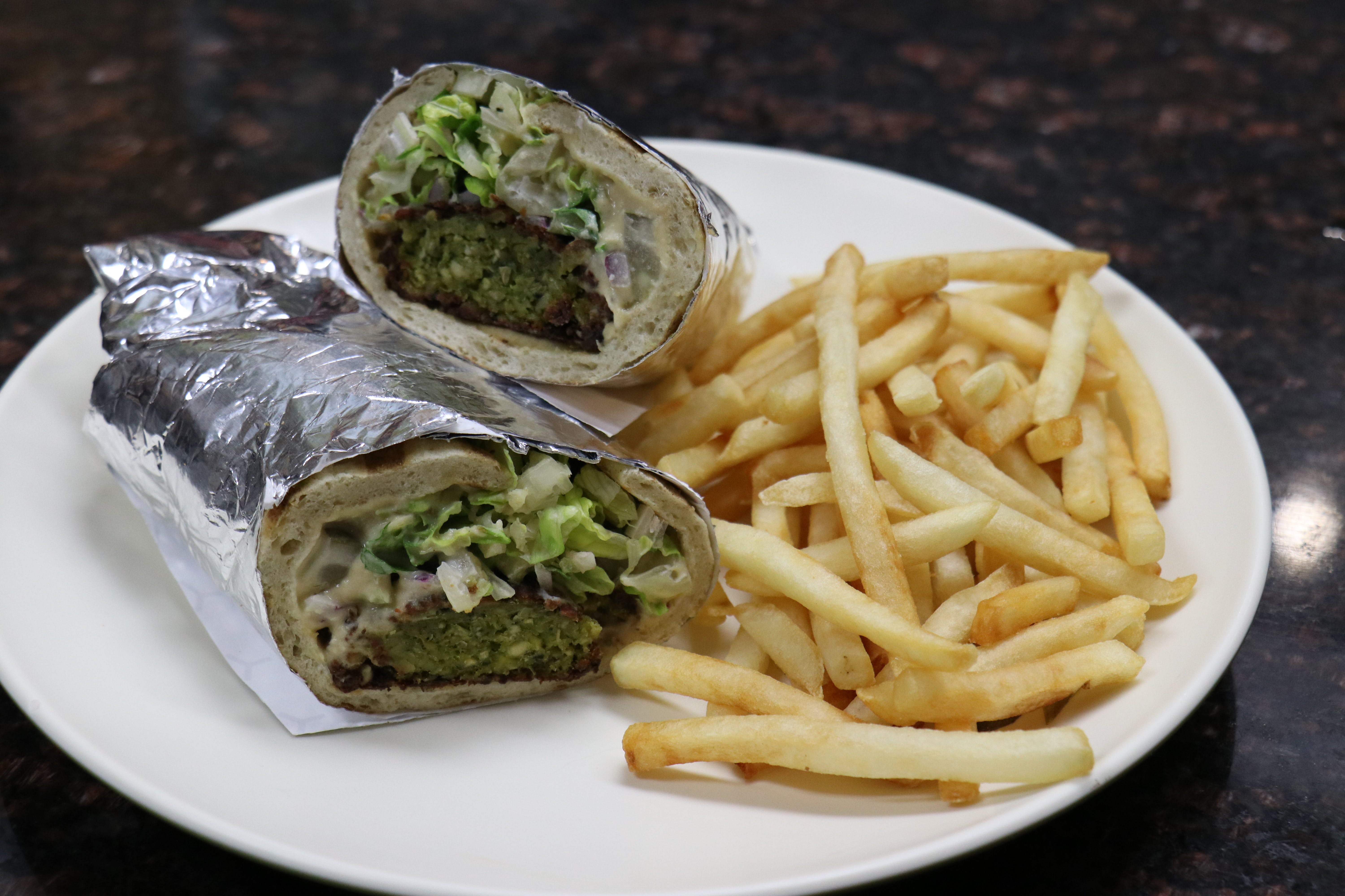 Order Falafel Wrap - Wrap food online from The Village Grille store, Great Falls on bringmethat.com