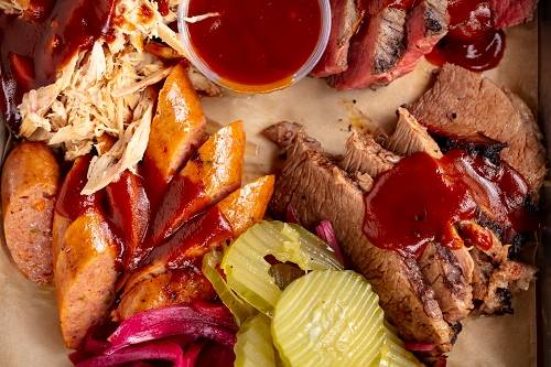 Order Three Meat Combo food online from Bad to The Bone BBQ store, San Juan Capistrano on bringmethat.com