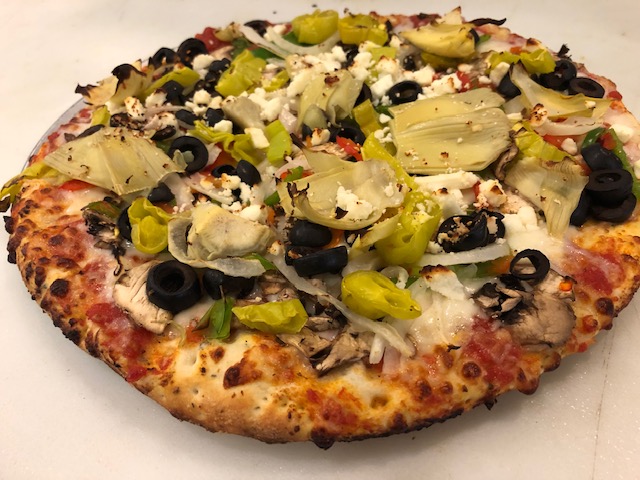 Order Veggie Supreme Pizza food online from Pizanos Pizza store, Reno on bringmethat.com